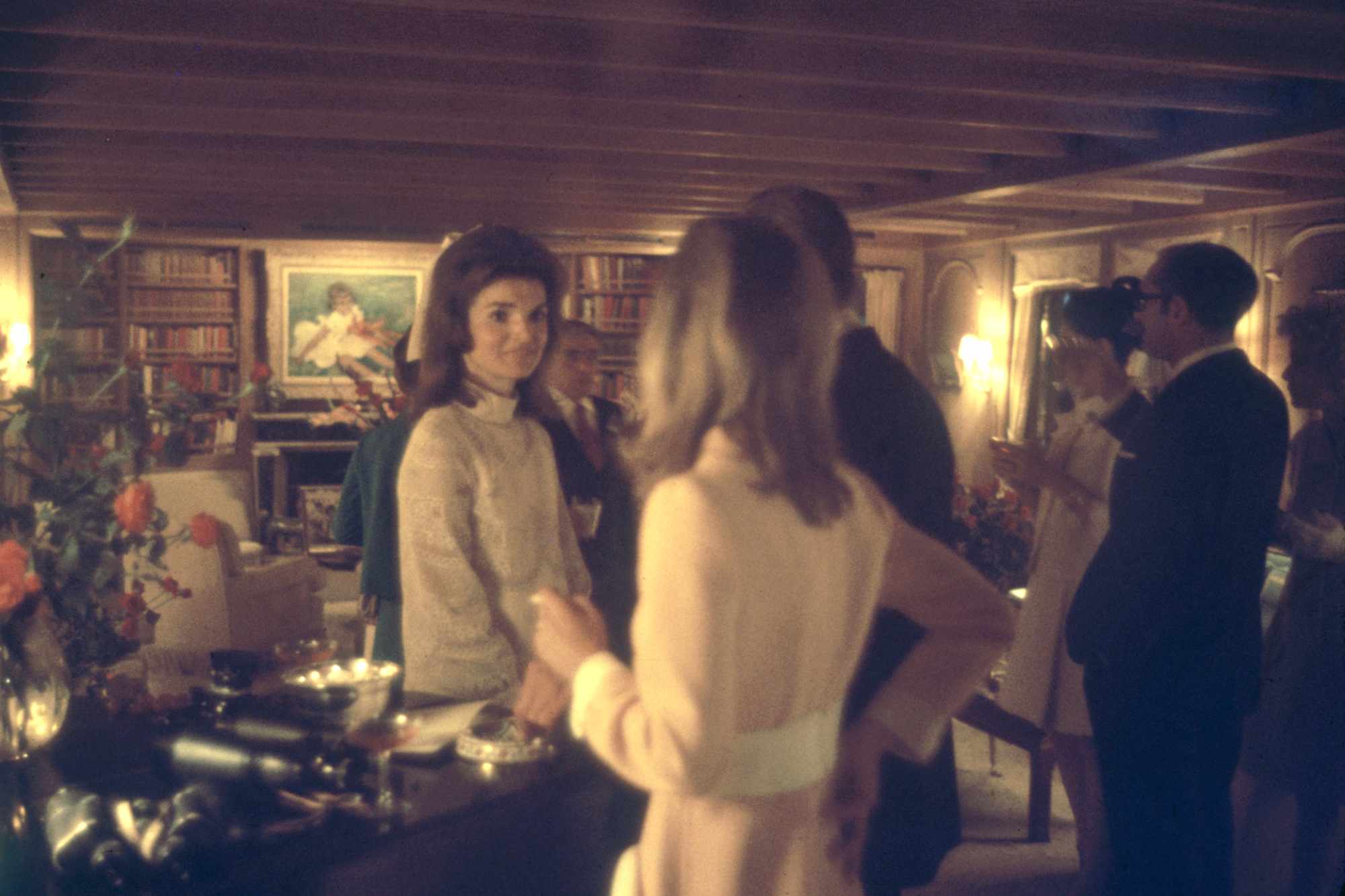 Sen. Edward Kennedy and Jacqueline Kennedy Onassis shake hands with patrons at the 21 Club on Aug. 12, 1980