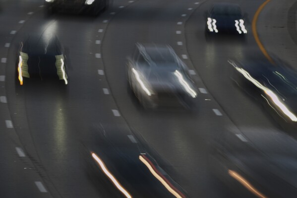 Vehicles drive along a highway Wednesday, July 30, 2025, in Cincinnati.
