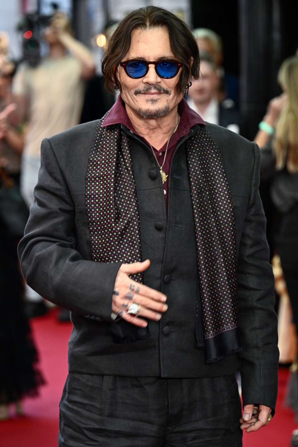 Director Jerry Bruckheimer and actor Johnny Depp attend the film premiere of "Pirates of the Caribbean" at Disneyland on June 28, 2003 in Anaheim, California.