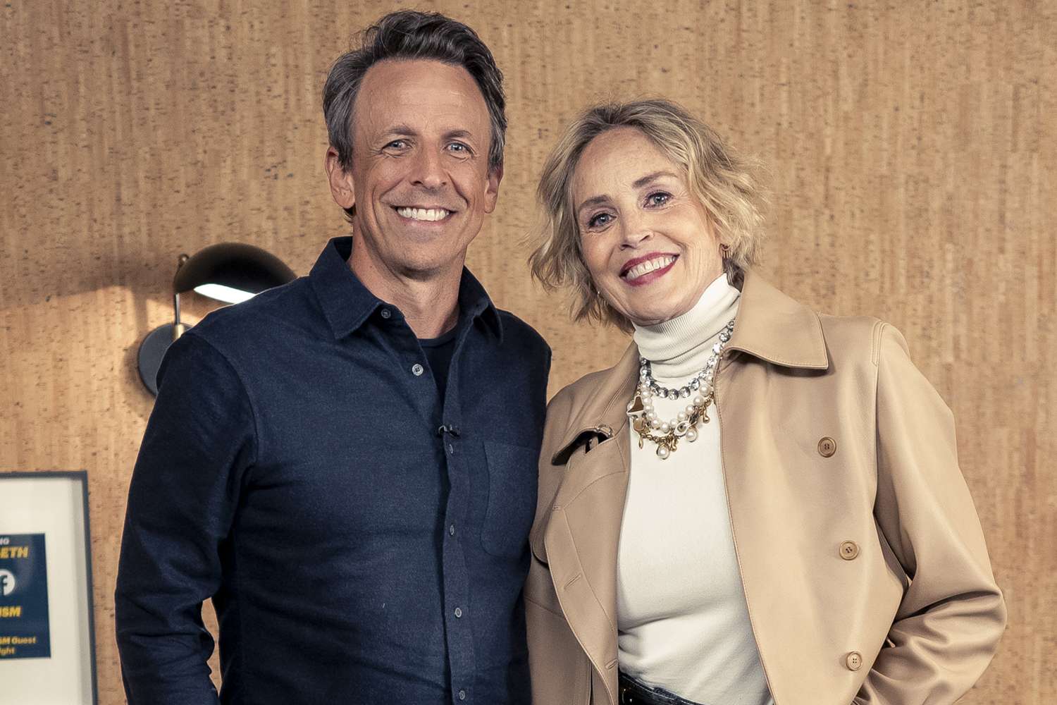Host Seth Meyers and actress Sharon Stone backstage