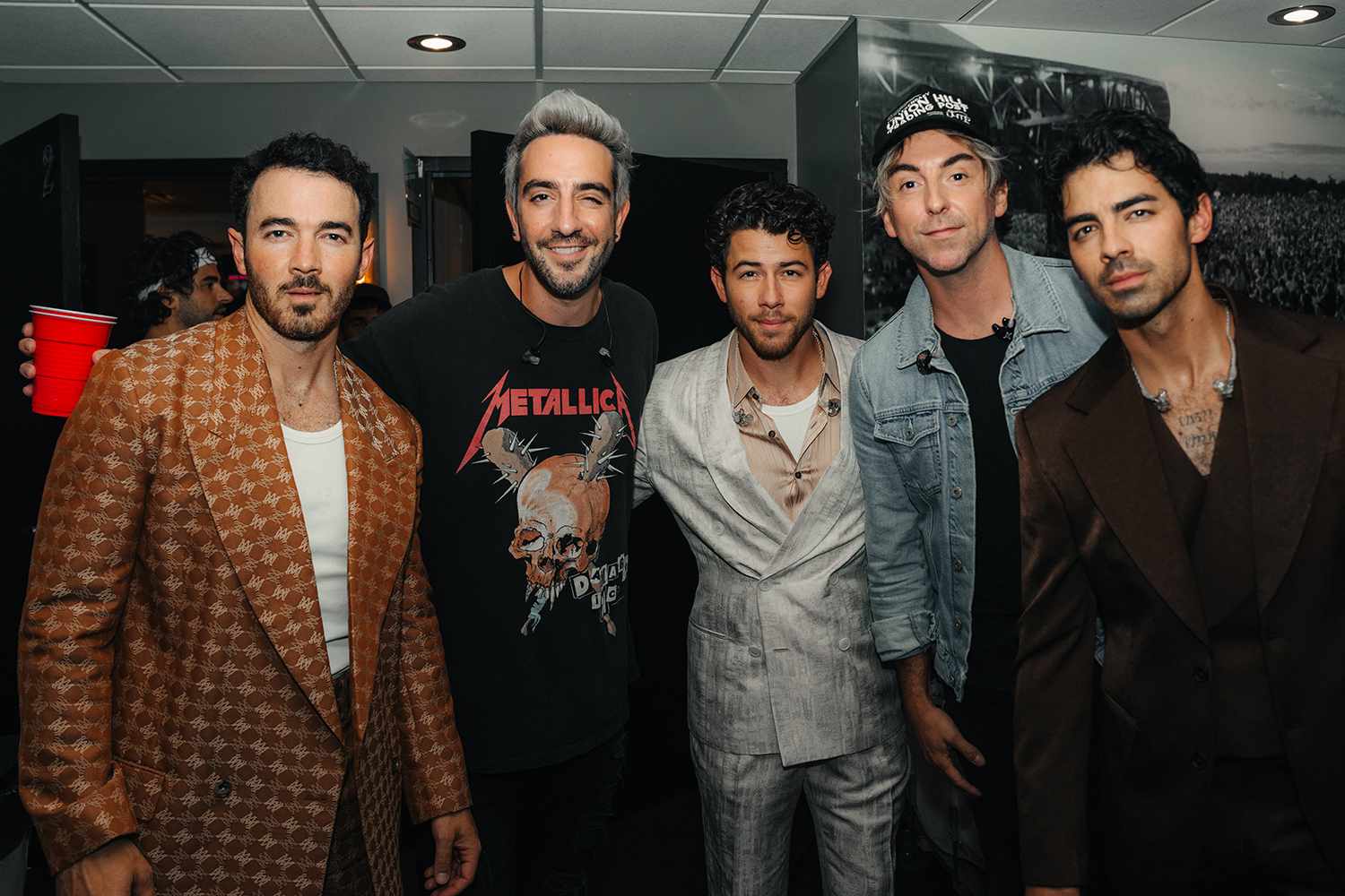 The Jonas Brothers and All Time Low backstage