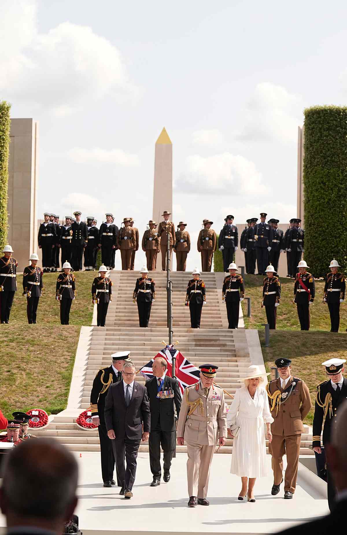 Prime Minister, King Charles III and Queen Camilla arrive for VJ Day service