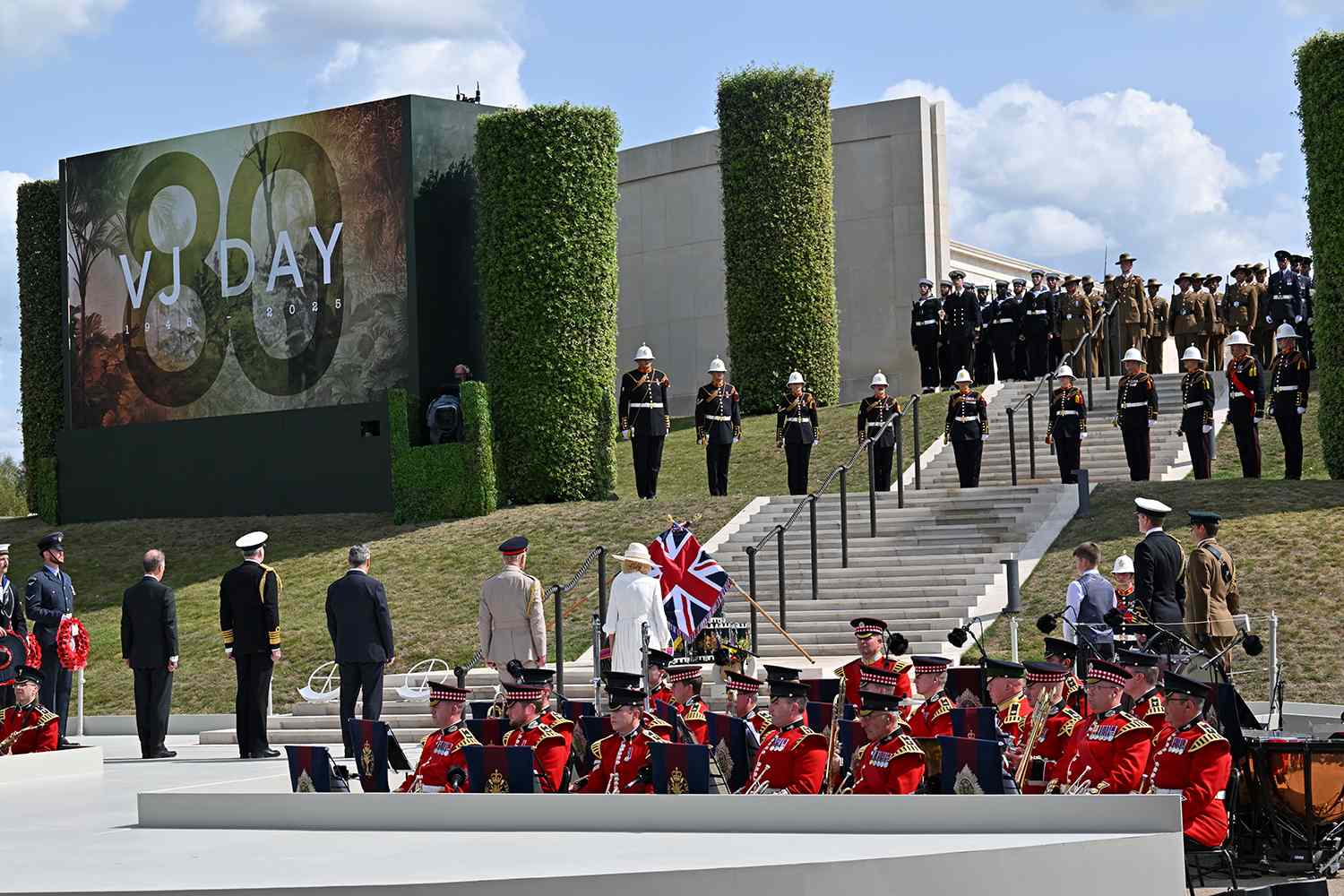 King Charles III, Paul Bennett, PM Starmer and Queen Camilla at VJ Day service