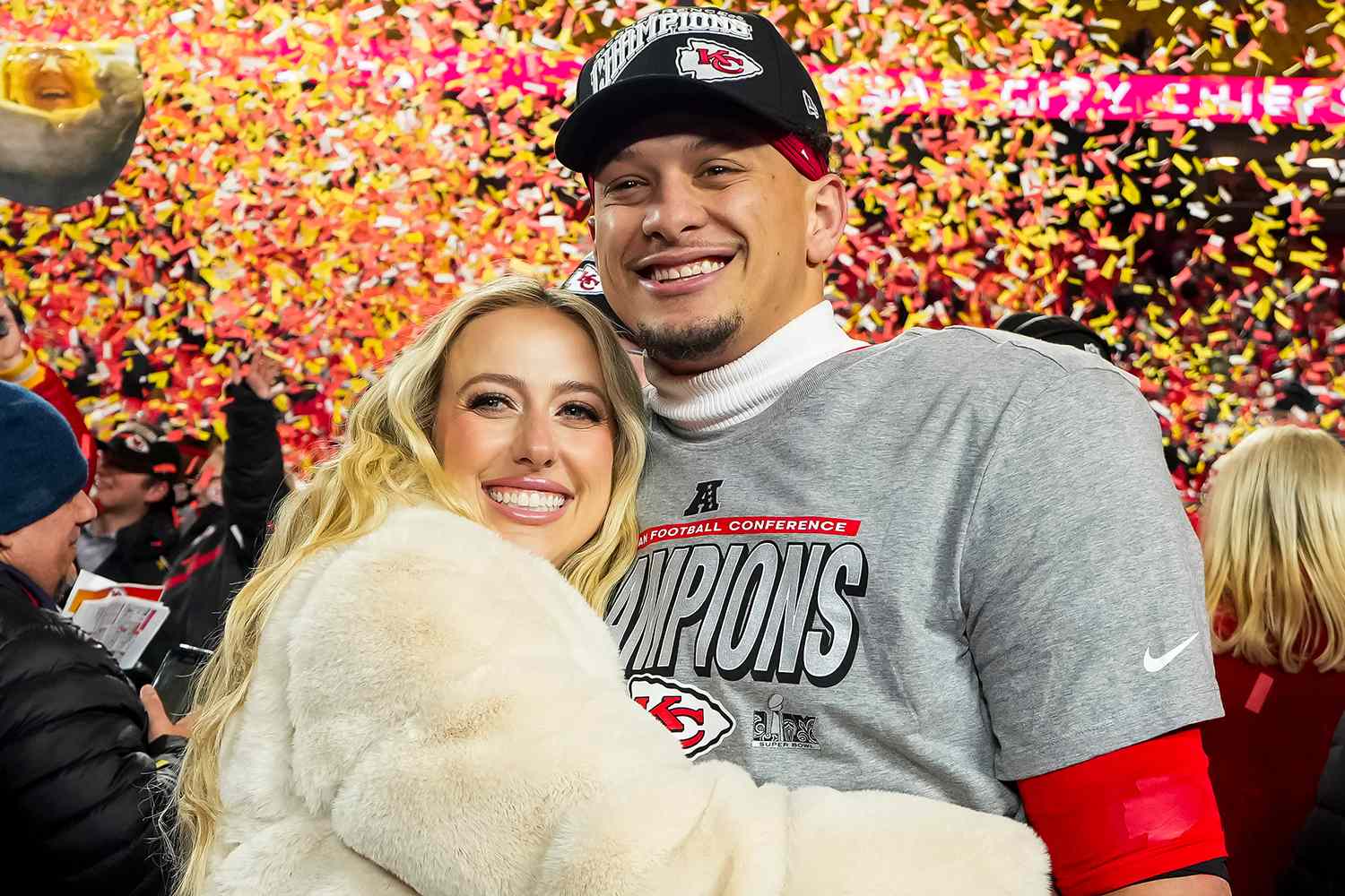Quarterback Patrick Mahomes #15 of the Kansas City Chiefs poses for a photo with his wife Brittany Mahomes after the AFC Championship game against the Buffalo Bills, at GEHA Field at Arrowhead Stadium on January 26, 2025 in Kansas City, Missouri.