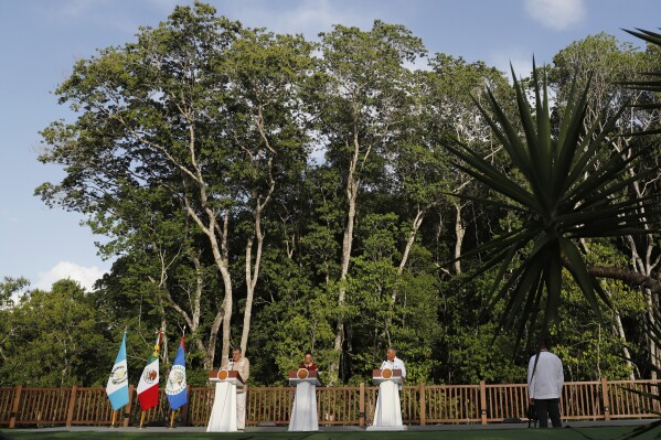 Guatemalan President Bernardo Arévalo, from left, Mexican President Claudia Sheinbaum and Belize Prime Minister Minister Johnny Briceño hold a joint press conference in Calakmul, Campeche state, Mexico, Friday, Aug. 15, 2025.