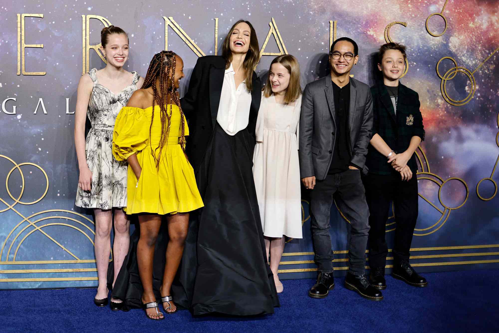 Angelina Jolie poses with her children