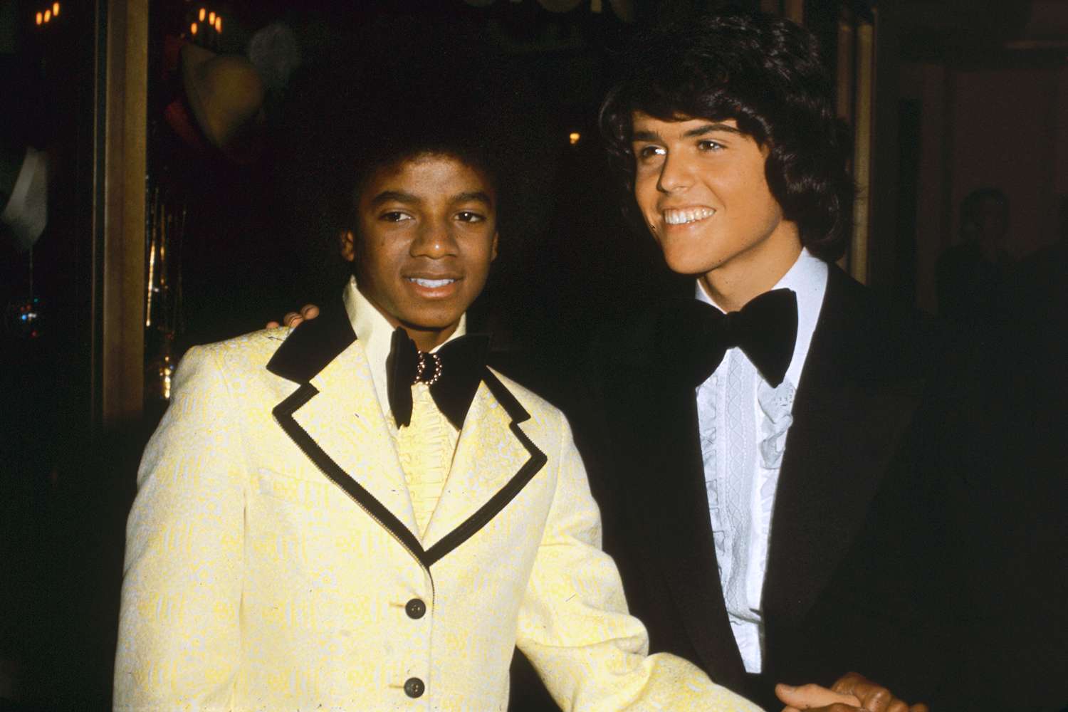 Michael Jackson poses with Donny Osmond at the American Music Awards in Hollywood, 19th February 1974.