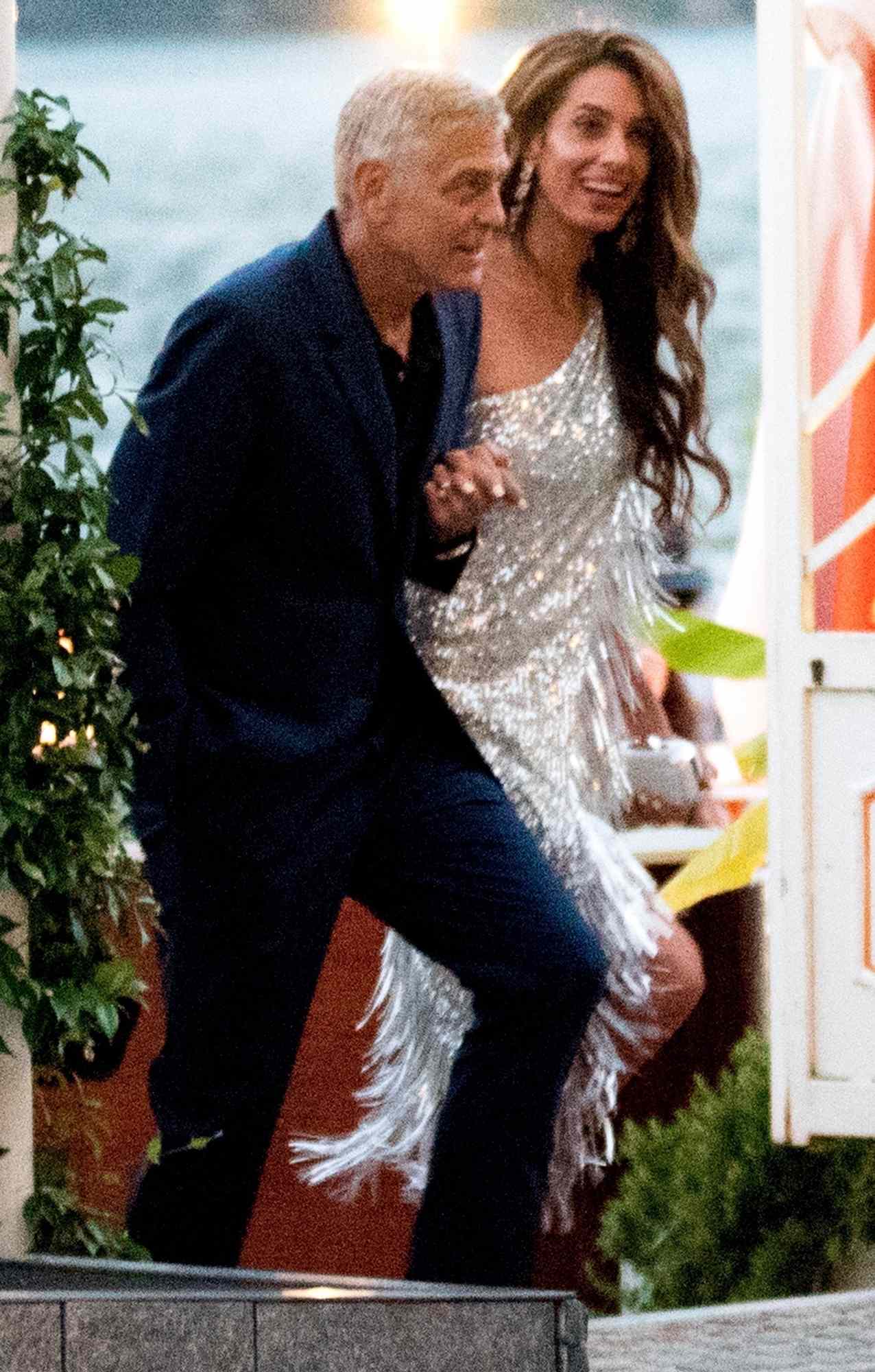 Amal Clooney and George Clooney in Lake Como, Italy on July 30, 2025