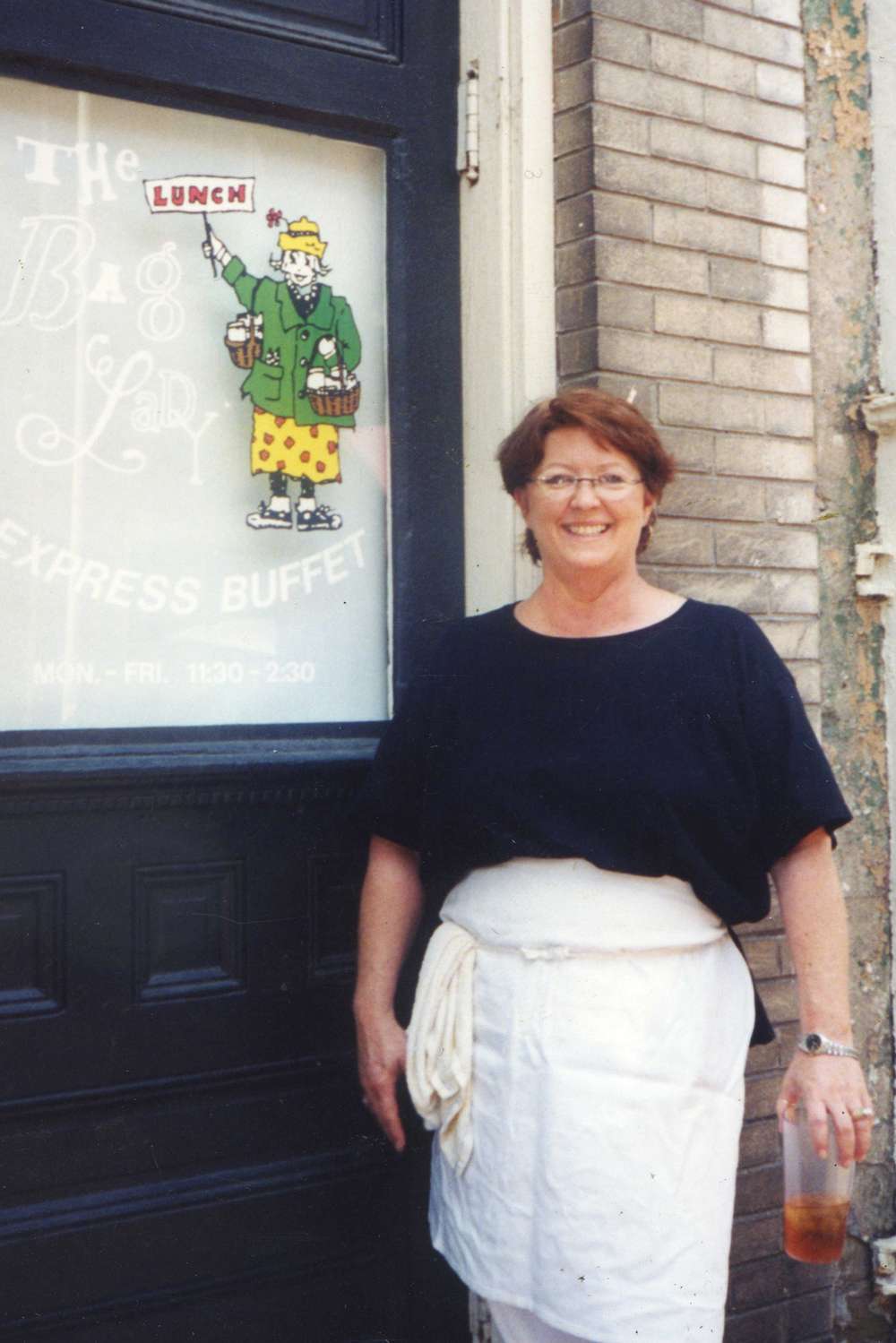 Paula Deen stands in front of her restaurant The Bag Lady Express Buffet in 1989.