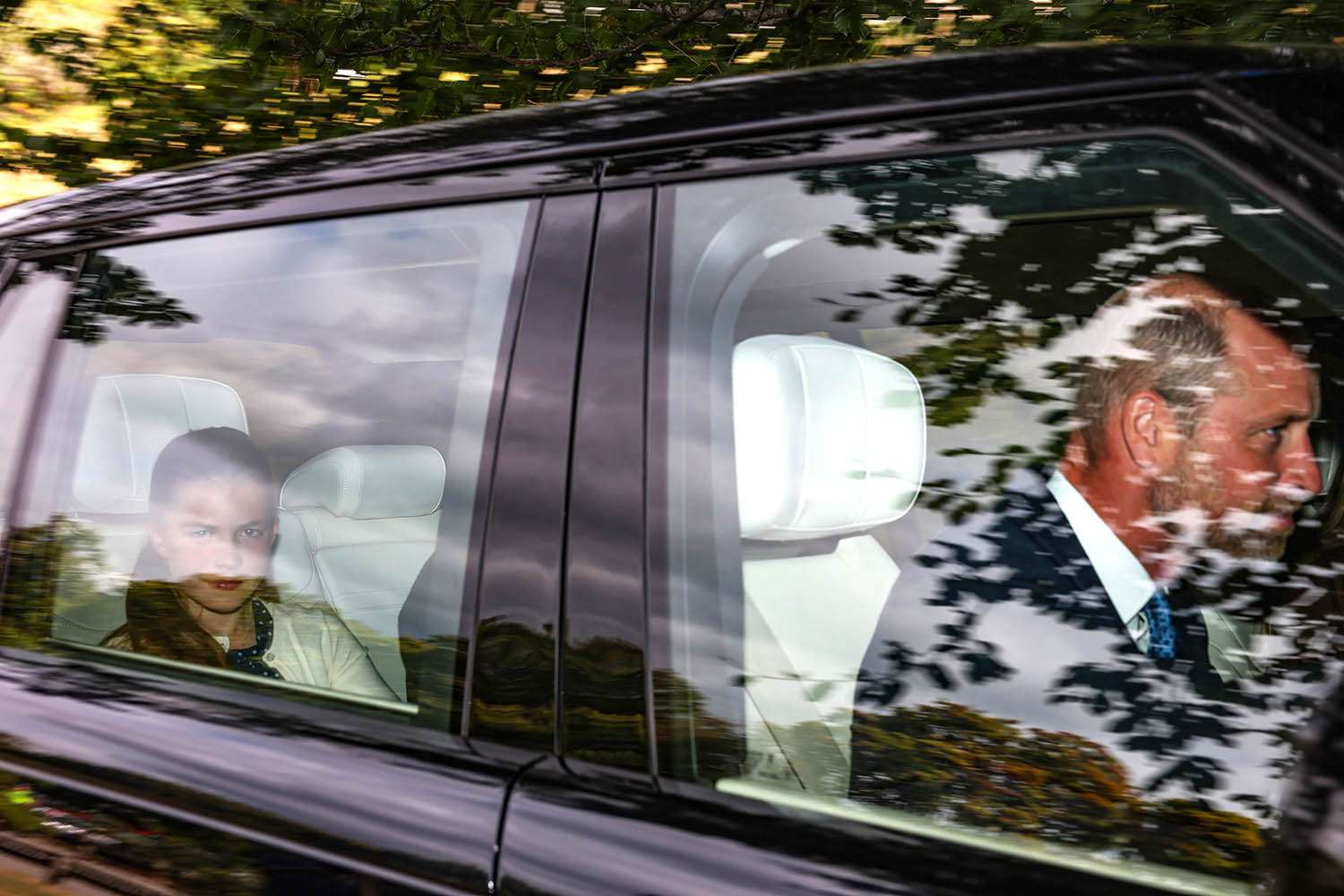 Prince William and Princess Charlotte arrive at Crathie Kirk