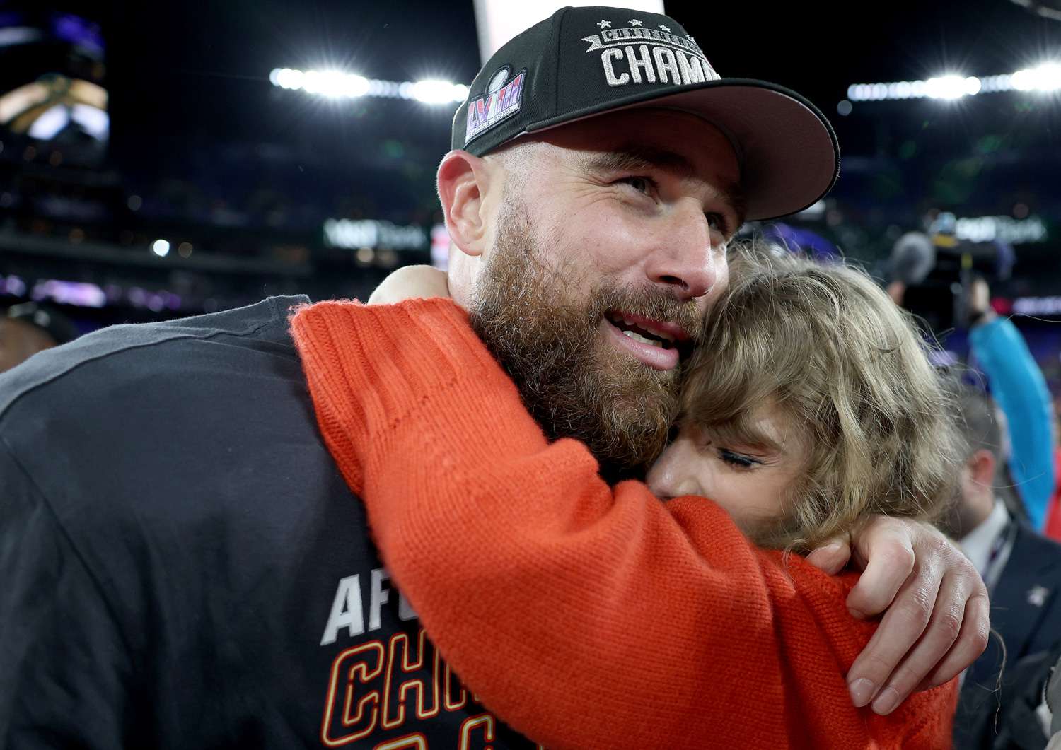 Travis Kelce of the Kansas City Chiefs celebrates with Taylor Swift