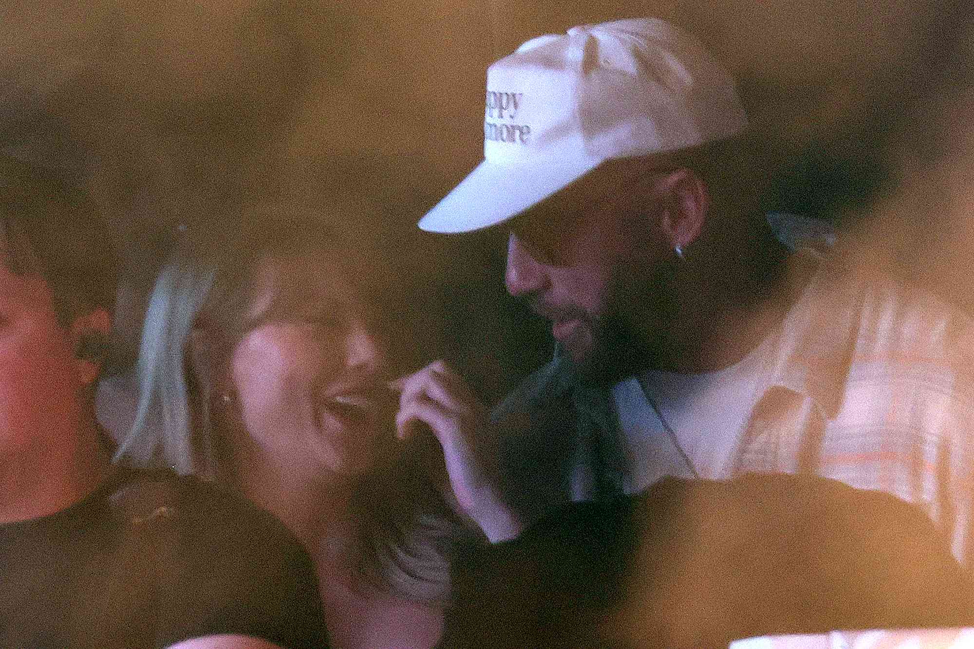 Taylor Swift and Travis Kelce watch Bleachers perform at Coachella on Saturday, April 13, 2024.