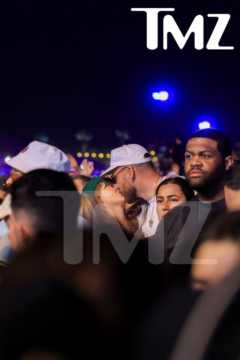 Taylor Swift and Travis Kelce Kissing in Middle of Coachella Crowd