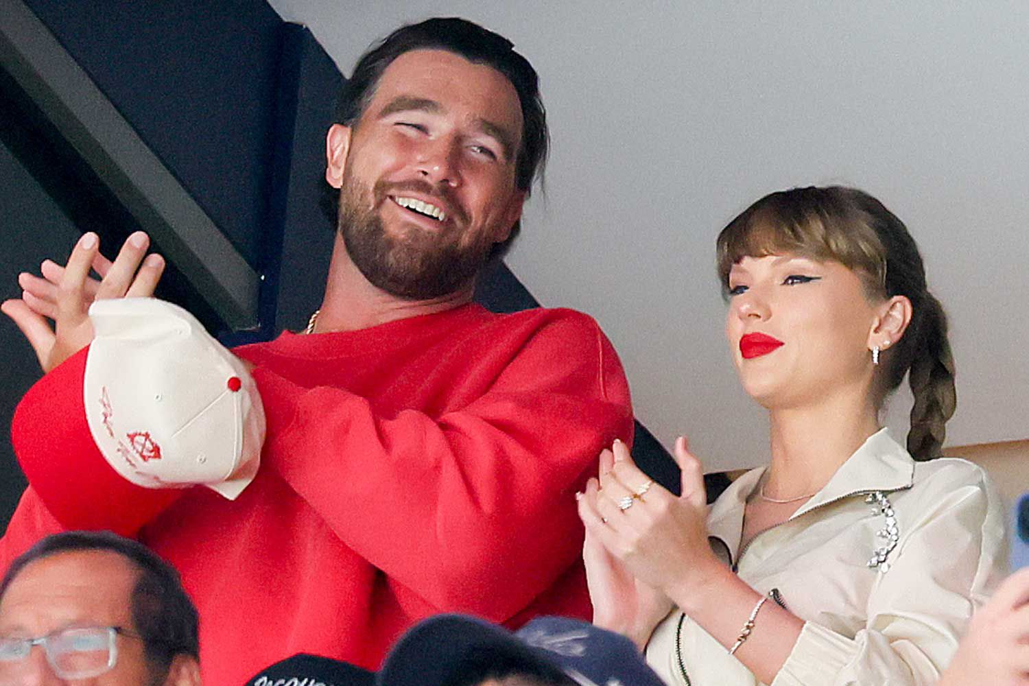 Travis Kelce and Taylor Swift react as the Edmonton Oilers and the Florida Panthers play during the first period in Game Four of the 2025 Stanley Cup Final at Amerant Bank Arena on June 12, 2025 in Sunrise, Florida.