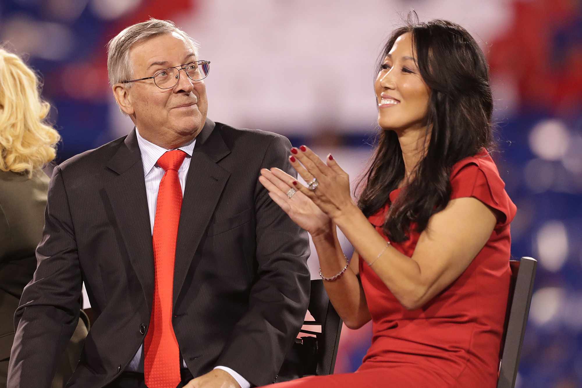 Terry and Kim Pegula watch as Hall of Famer Bruce Smith get an award during the game between the Buffalo Bills and New York Jets on September 15, 2016.