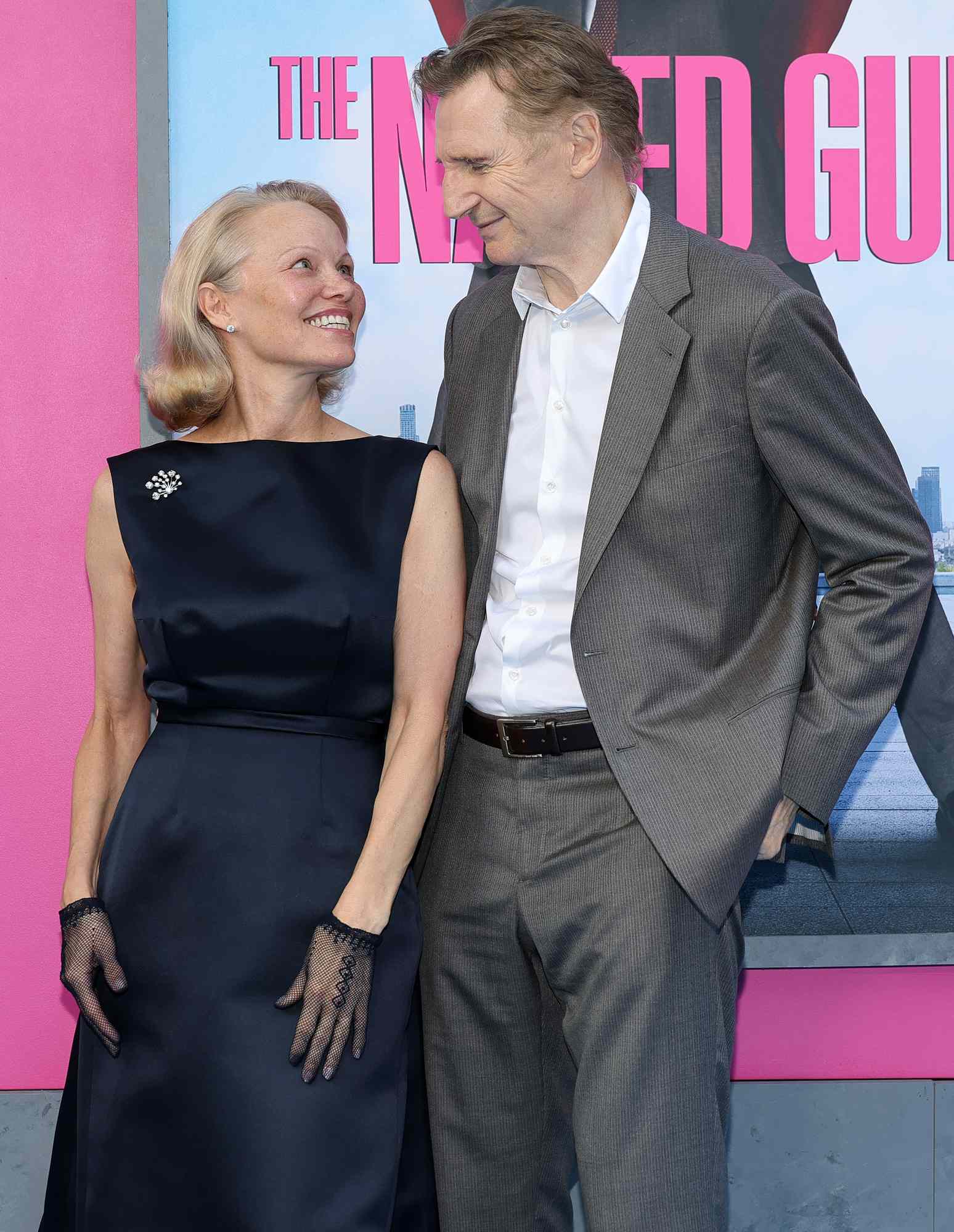 Pamela Anderson and Liam Neeson attend "The Naked Gun" New York premiere on July 28, 2025 in New York City.