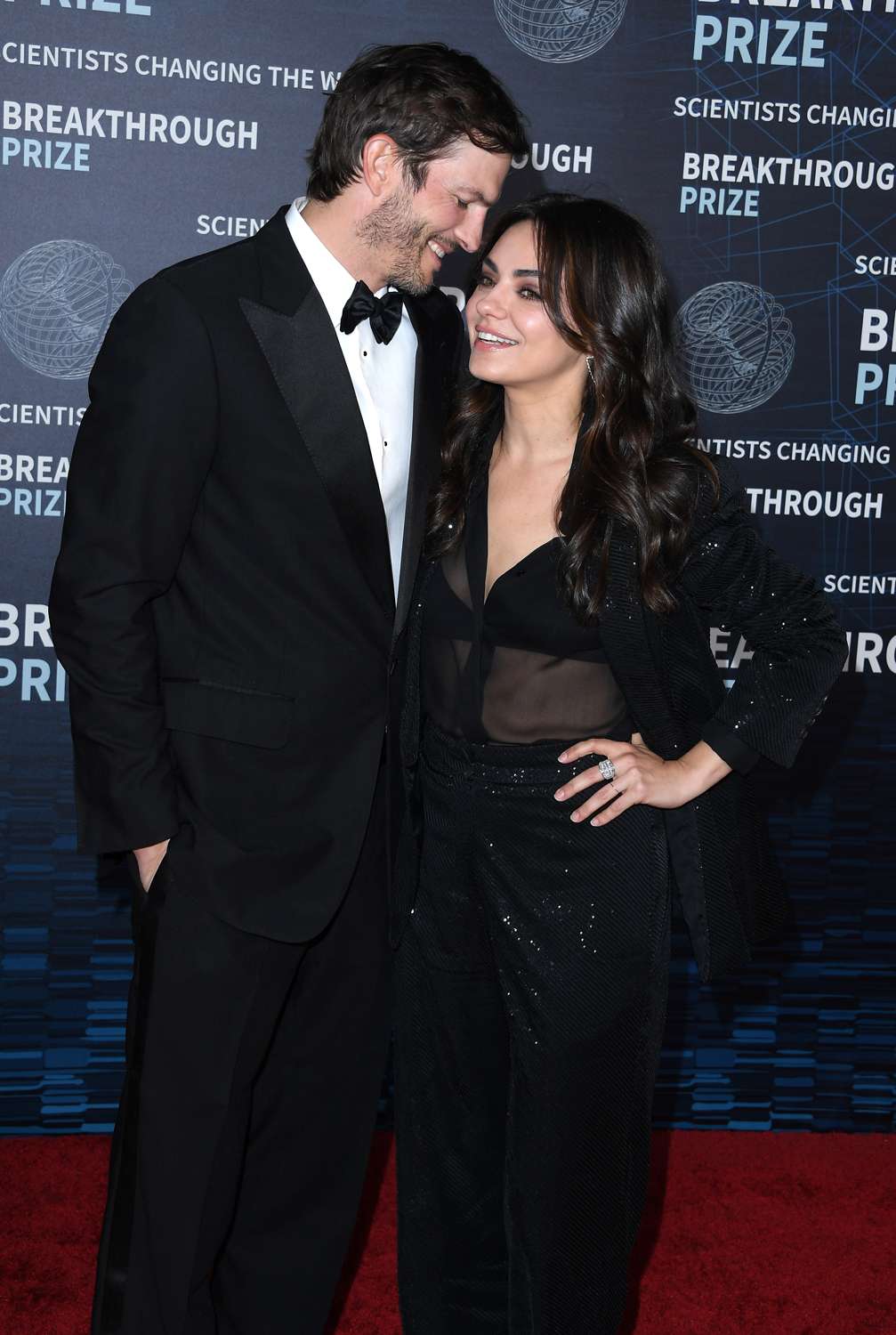 Ashton Kutcher and Mila Kunis arrives at the 9th Annual Breakthrough Prize Ceremony at Academy Museum of Motion Pictures on April 15, 2023 in Los Angeles, California.