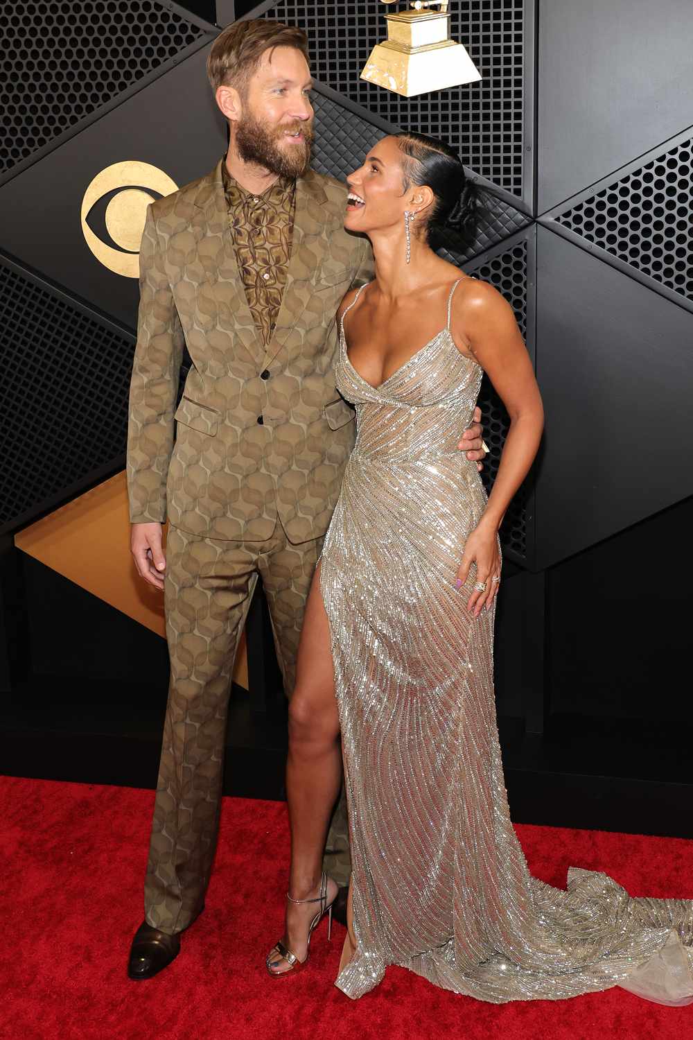 Calvin Harris and Vick Hope attend the 66th GRAMMY Awards