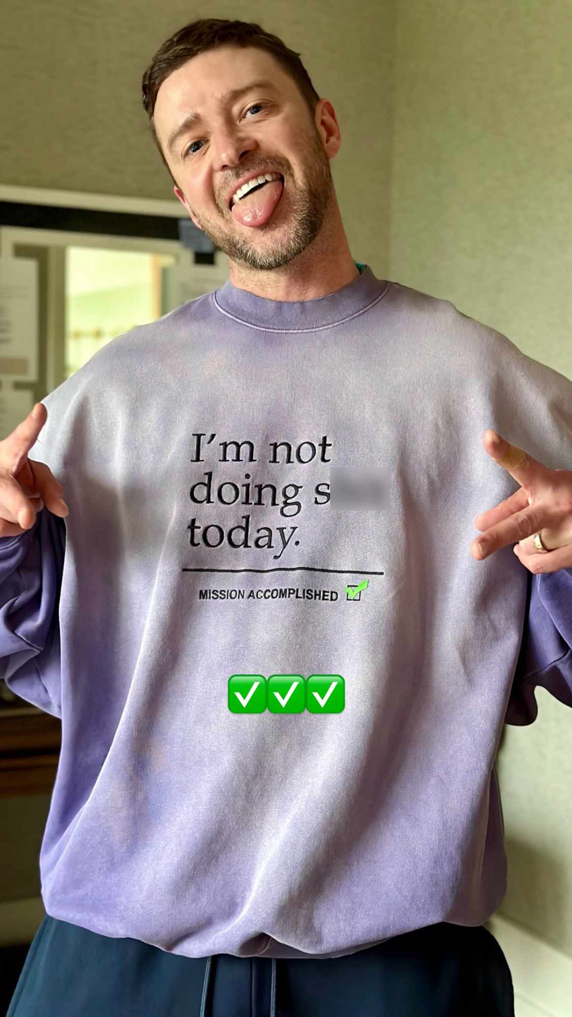 Justin Timberlake in a sweatshirt that says "I'm not doing s*** today"
