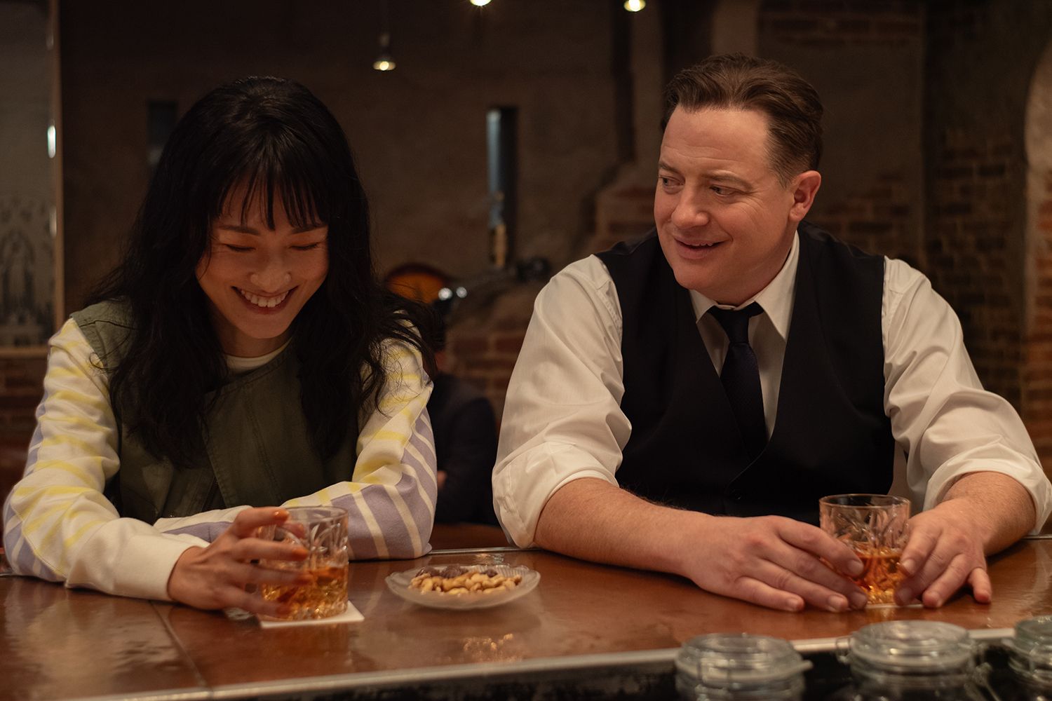 Mari Yamamoto and Brendan Fraser in RENTAL FAMILY