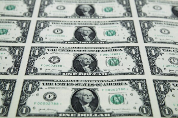 A sheet of new $1 bills seen at the Bureau of Engraving and Printing in Washington.