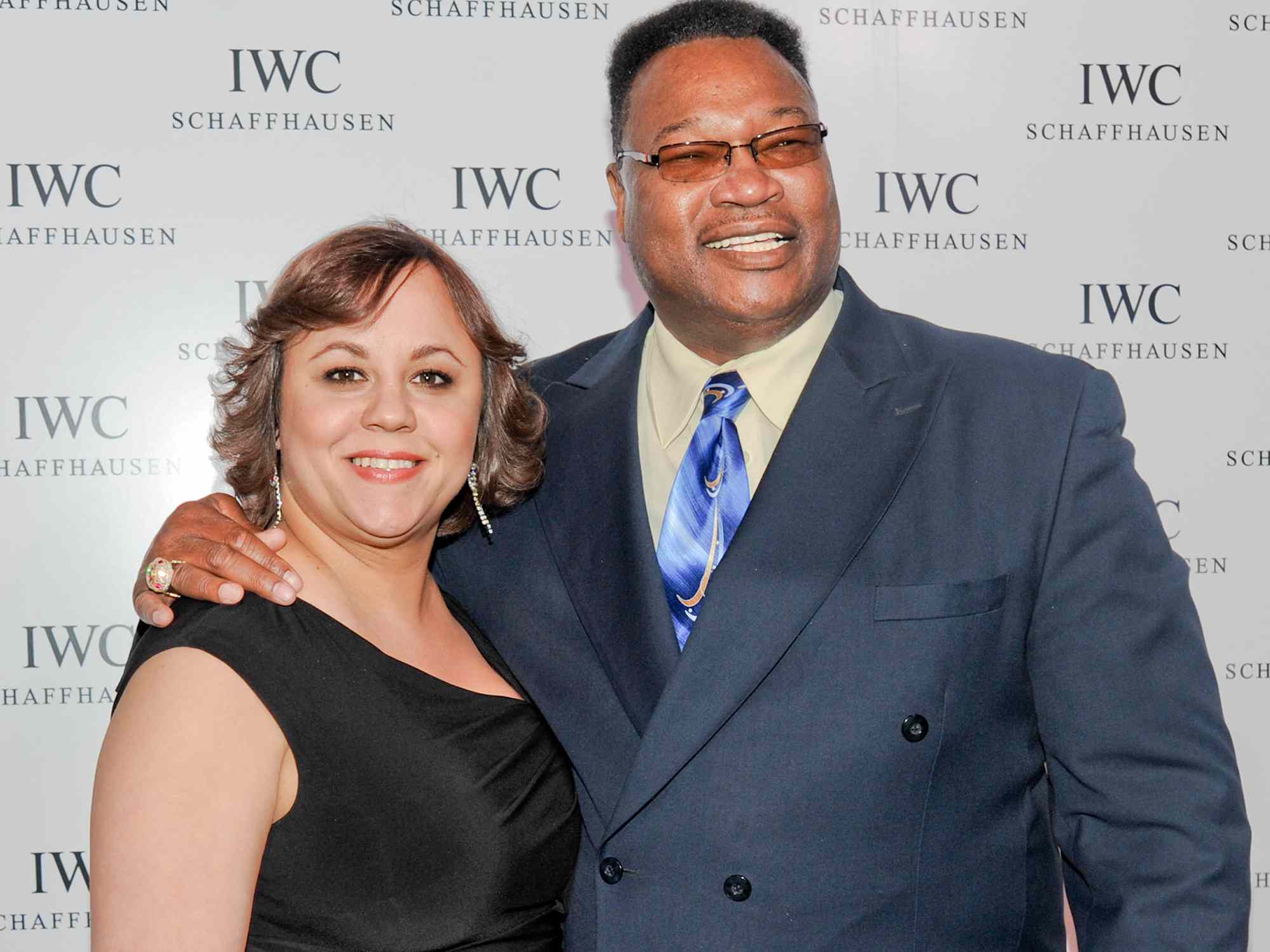 Miya Ali and Larry Holmes attend the IWC Flagship Store opening on April 25, 2012 in New York City.