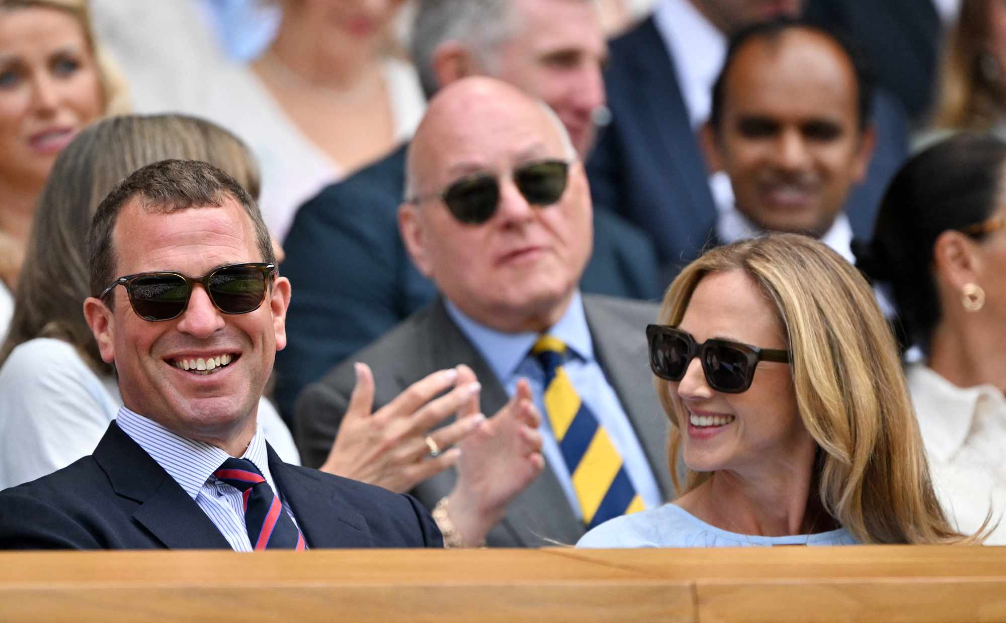 Peter Phillips and British writer Harriet Sperling are seen in the royal box of Centre Court for the women