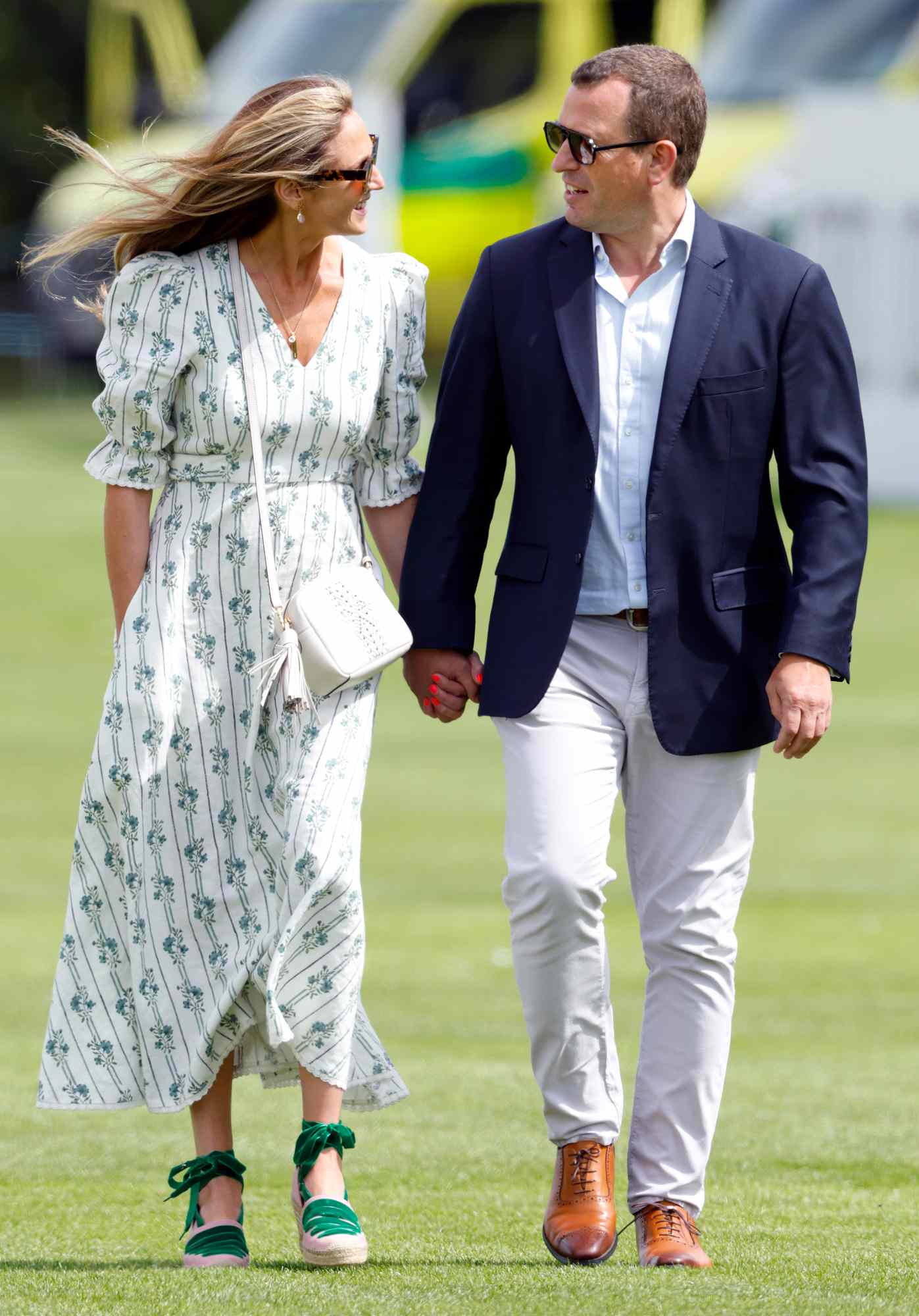 Harriet Sperling and Peter Phillips attend the Out-Sourcing Inc. Royal Charity Polo Cup 2024 at The Castle Ground, Guards Polo Club, Flemish Farm on July 12, 2024 in Windsor, England.