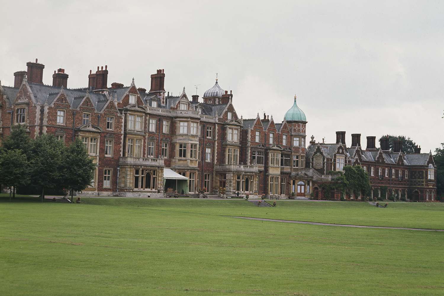 The West Front of Sandringham House, on the British Royal Family