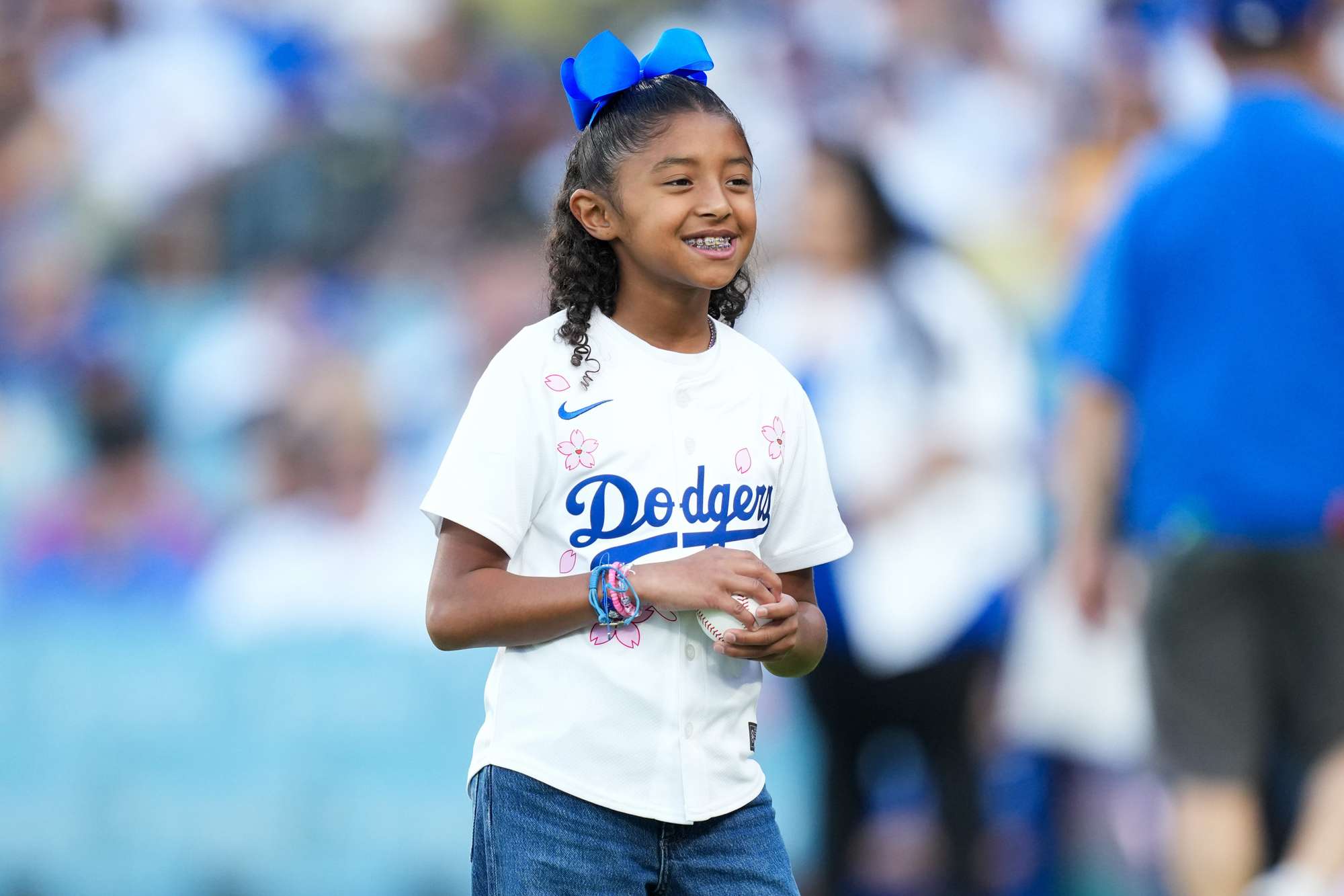 Bianka Bryant prepares to throw the first pitch