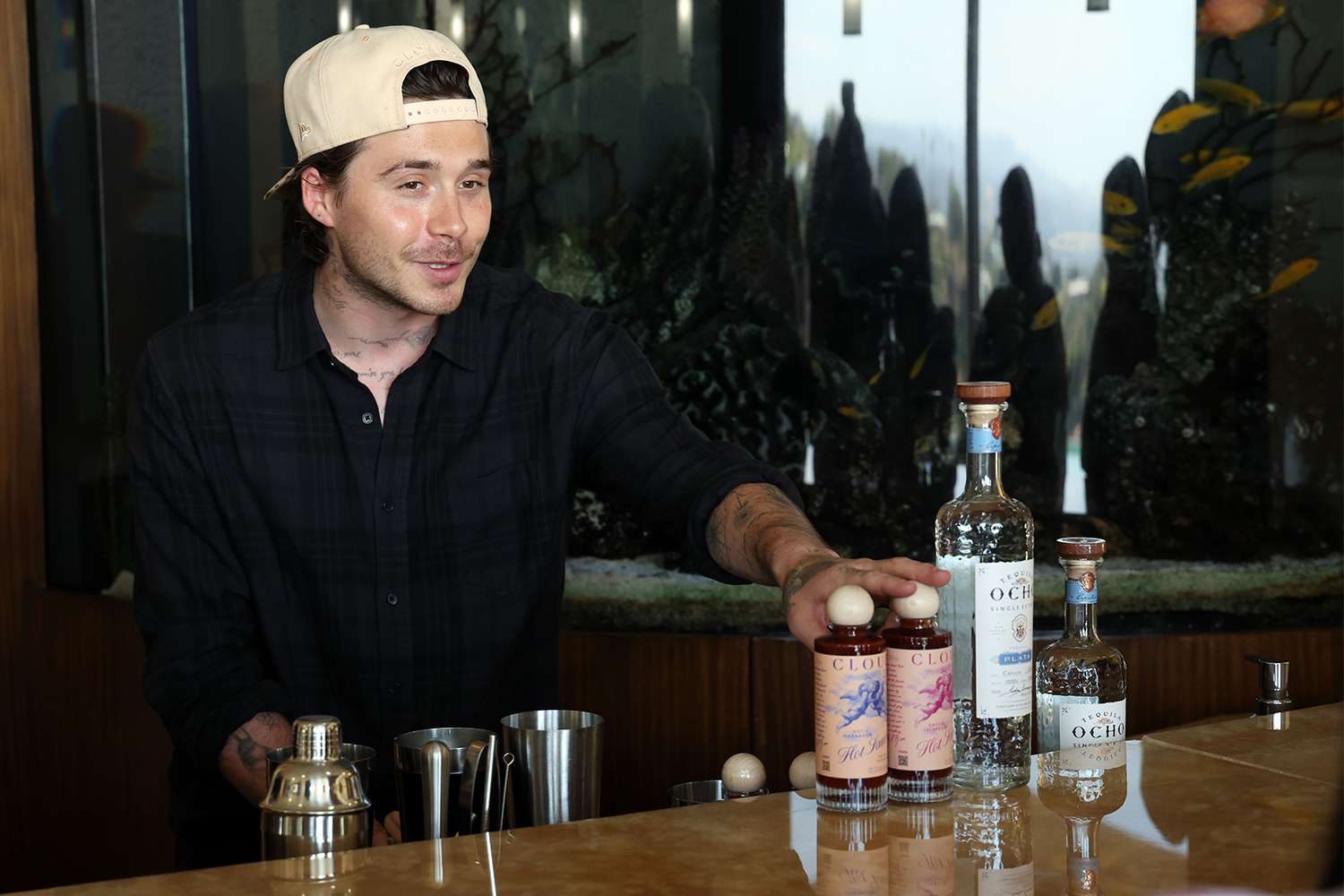 Brooklyn Peltz Beckham interacts with guests at Airbnb event