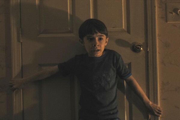 This image released by Warner Bros. Pictures shows Cary Christopher in a scene from "Weapons." (Warner Bros. Pictures via AP)