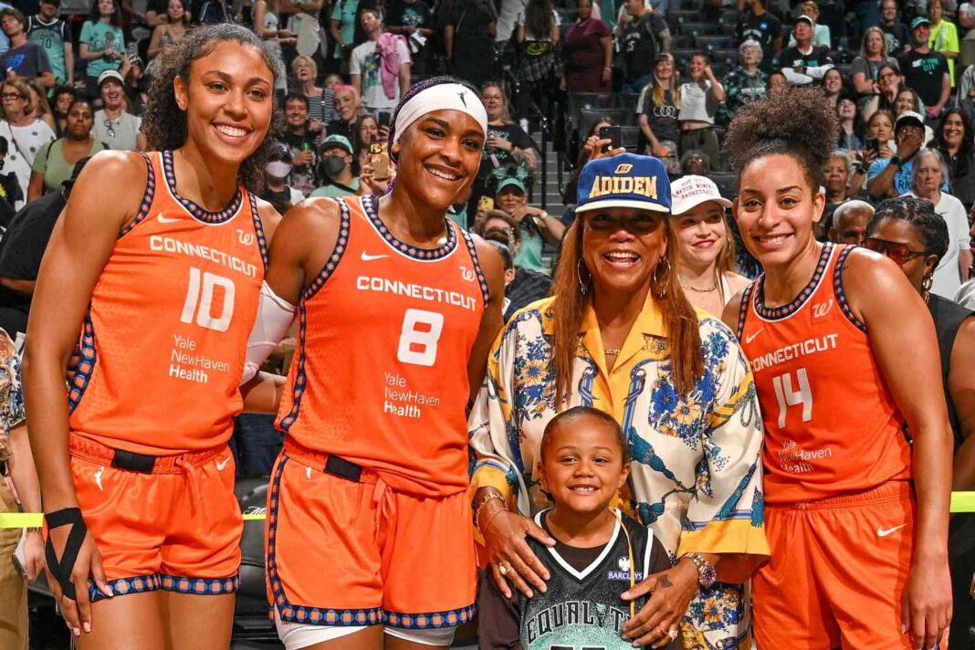 Queen Latifah and Son Rebel Step Out for WNBA Game, Promoting Unity On and Off the Court