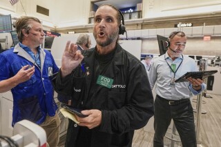 Wall Street Reaches New Heights, Powered by Tech Gains Amidst Mixed Economic Signals