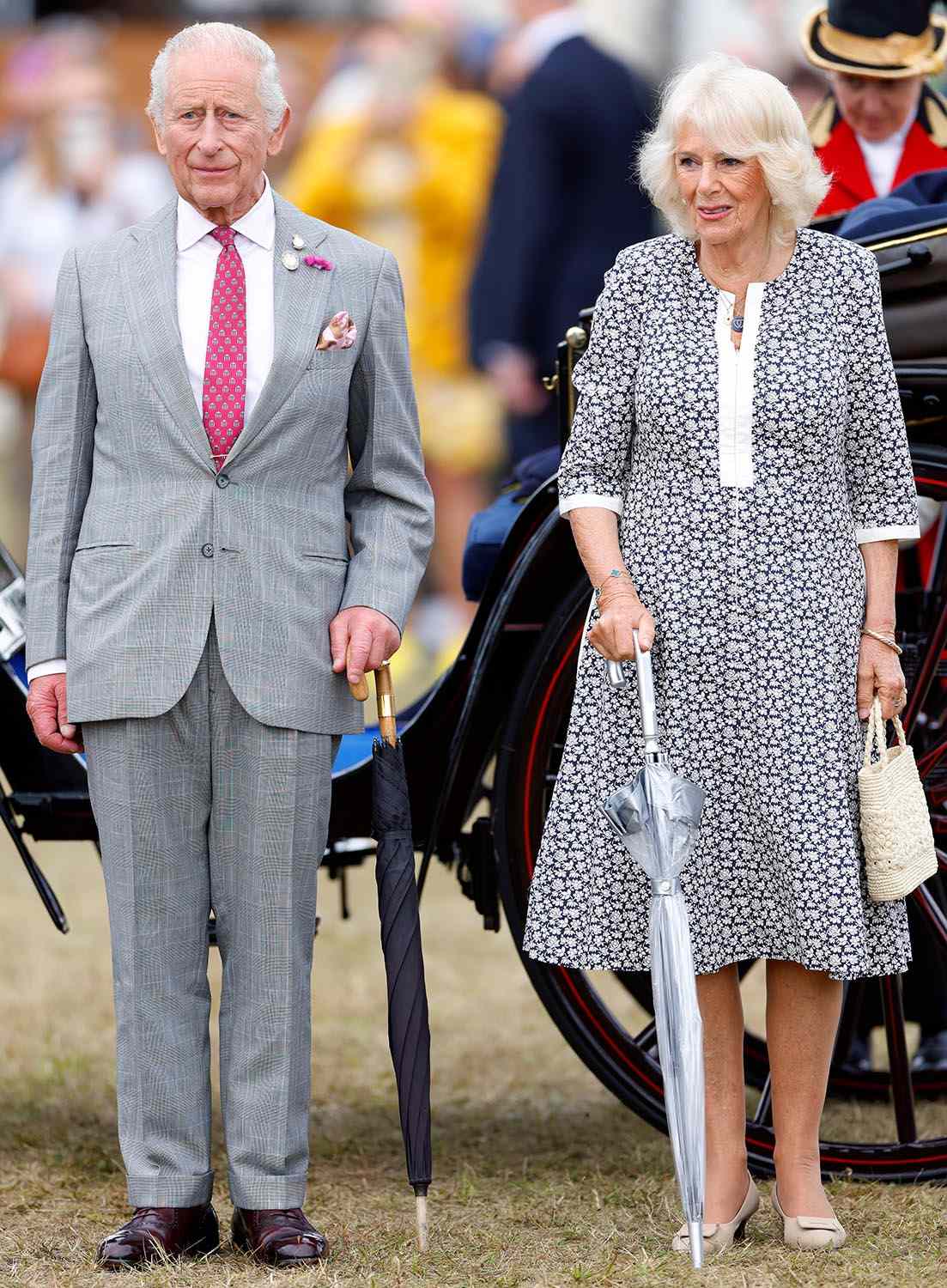 King Charles III and Queen Camilla arrive, in a horse drawn carriage, for a visit to the Sandringham Flower Show 2025 at Sandringham House on July 23, 2025 in King