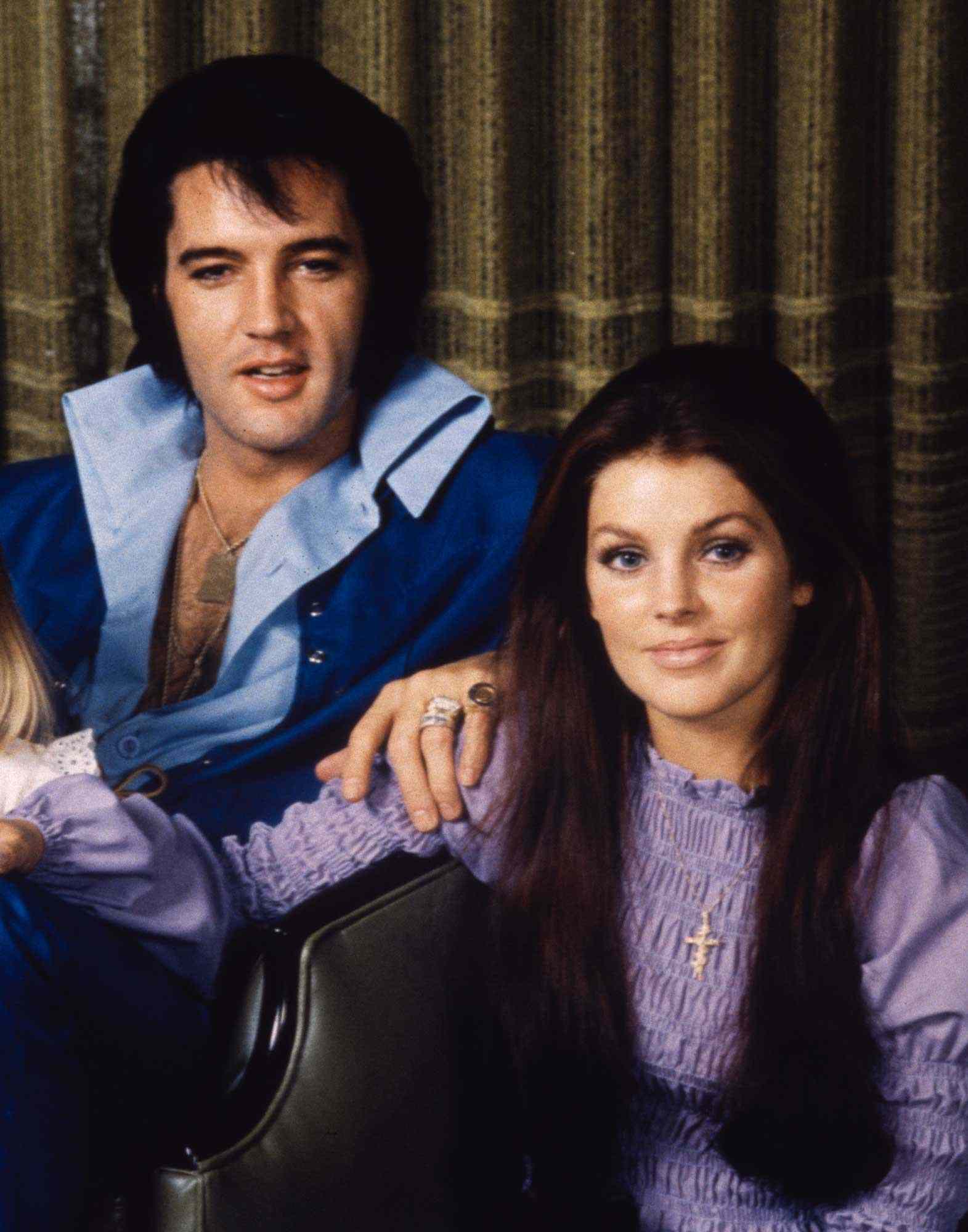 Elvis Presley with his wife Priscilla Presley
