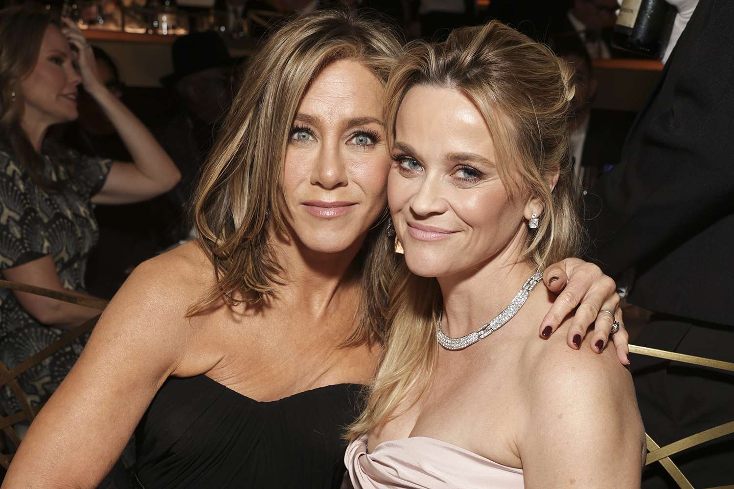Jennifer Aniston and Reese Witherspoon at the 81st Annual Golden Globe Awards