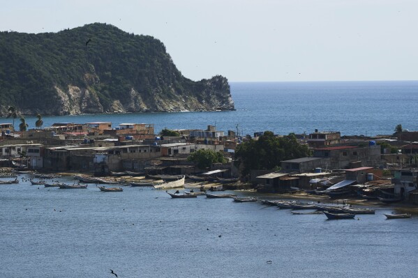 Boats are anchored off El Morro de Puerto Santo, on Venezuela