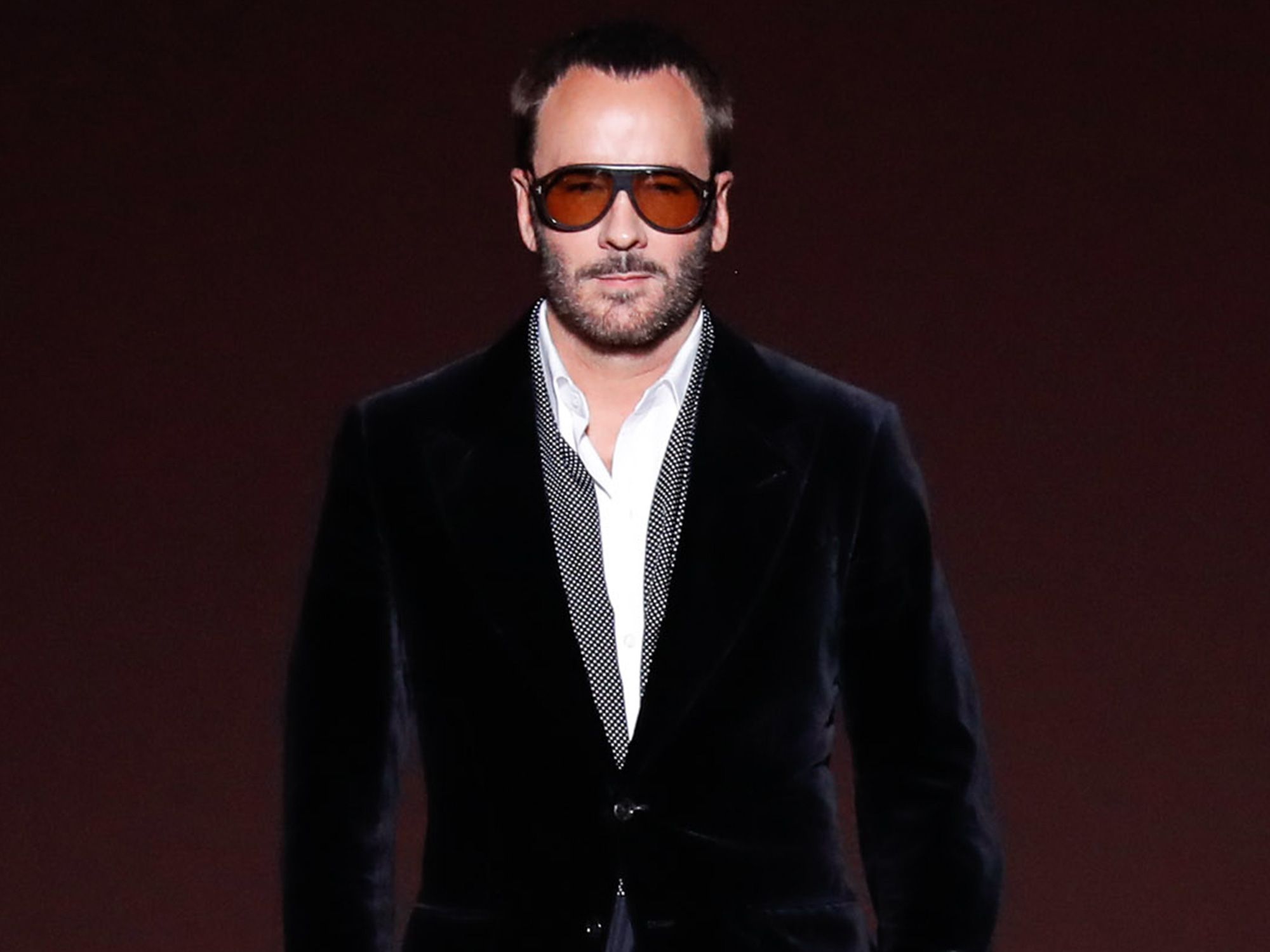 Tom Ford walks the runway at the conclusion of his Tom Ford Autumn/Winter 2019 Collection