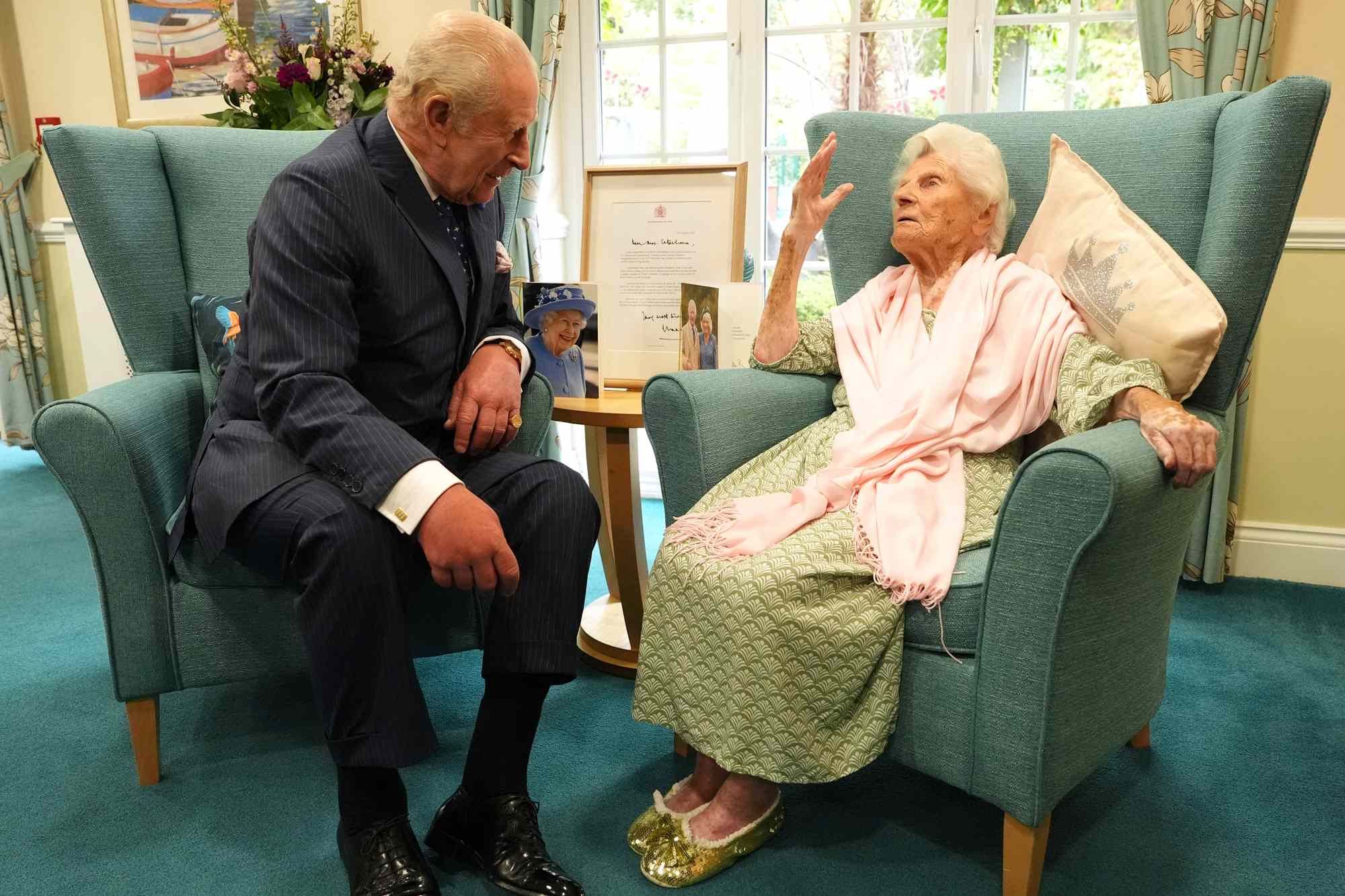 King Charles III meets the world's oldest person, 116-year-old Ethel Caterham, at Hallmark Lakeview Care Home in Lightwater, Surrey. Picture date: Thursday September 18, 2025.