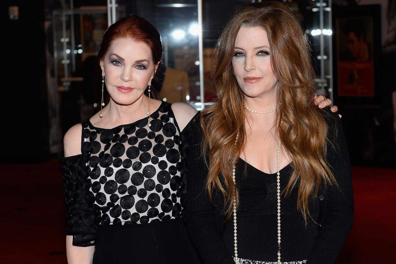 Actress Priscilla Presley and Lisa Marie Presley attend the ribbon-cutting ceremony during the grand opening of "Graceland Presents ELVIS: The Exhibition"