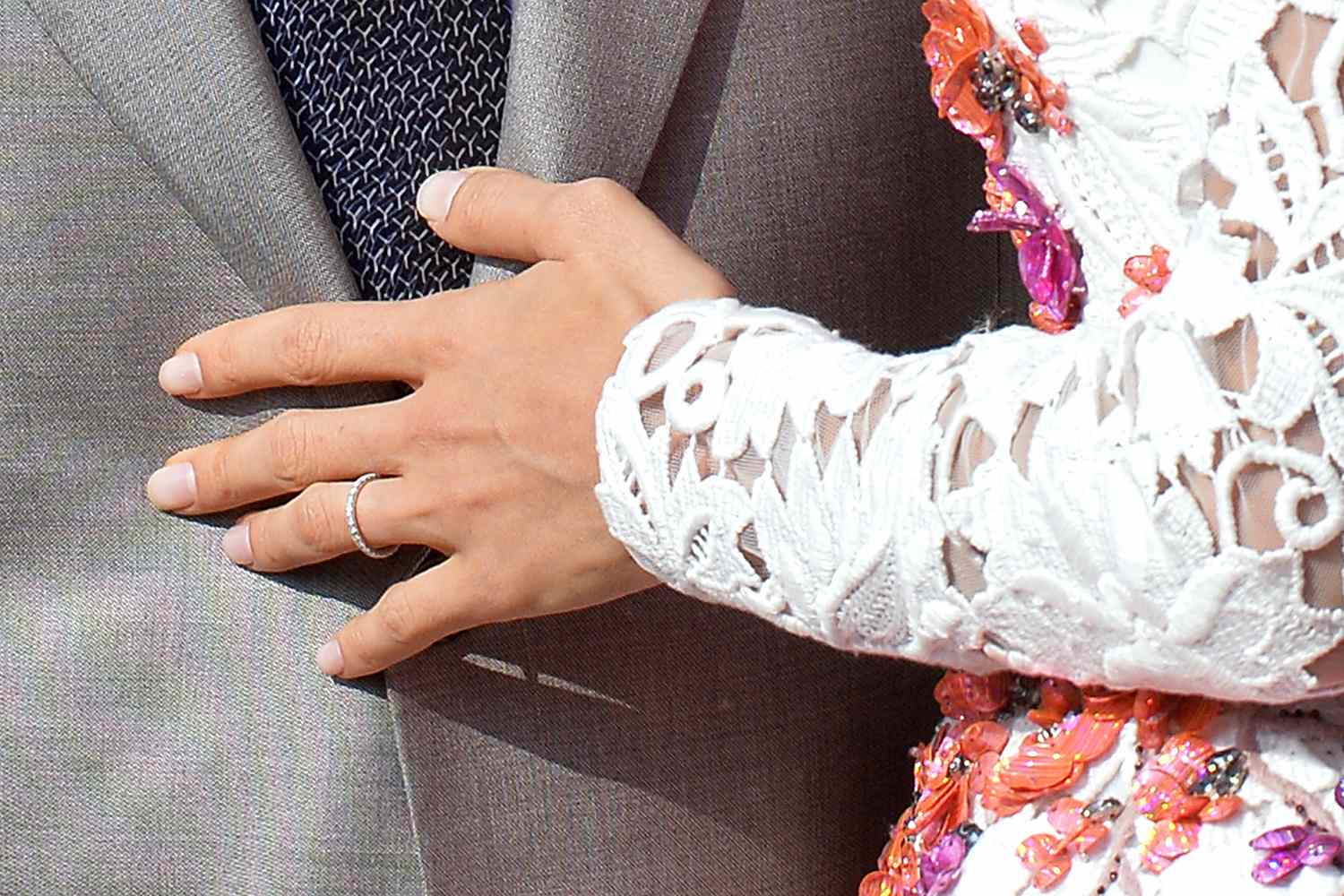 A close up shows the wedding band of Amal Alamuddin as she stands next to her husband George Clooney aboard a taxi boat on the Grand Canal on September 28, 2014 in Venice.