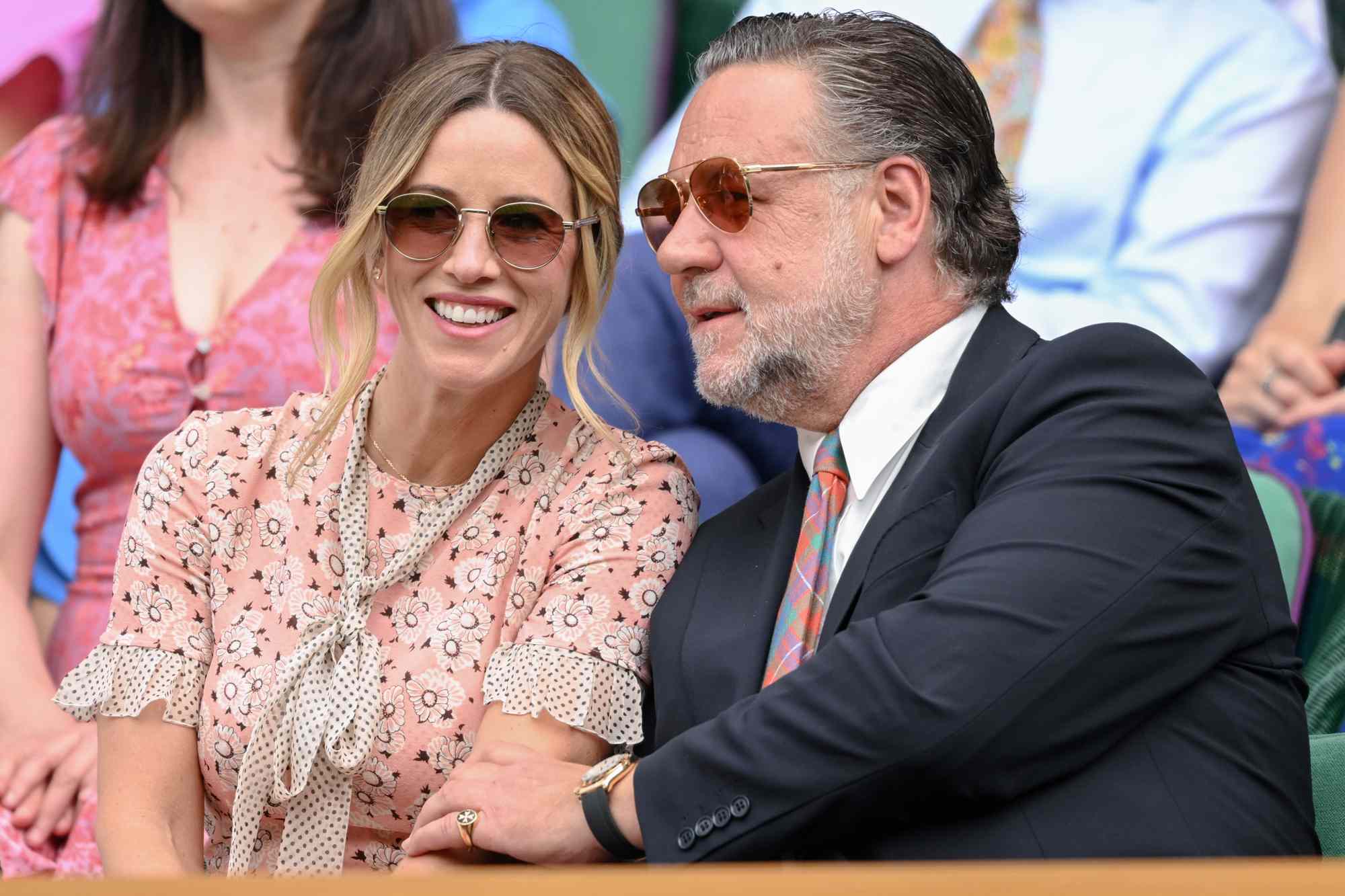 Britney Theriot and Russell Crowe attend day two of the Wimbledon Tennis Championships at the All England Lawn Tennis and Croquet Club on July 01, 2025 in London, England.
