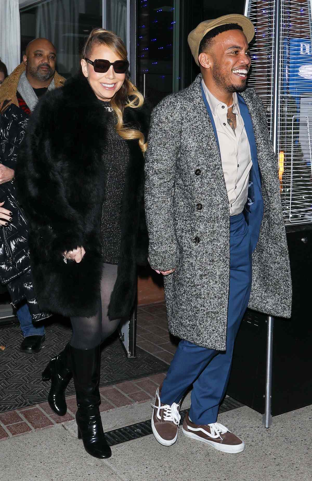 Mariah Carey and Anderson .Paak all smiles after dinner