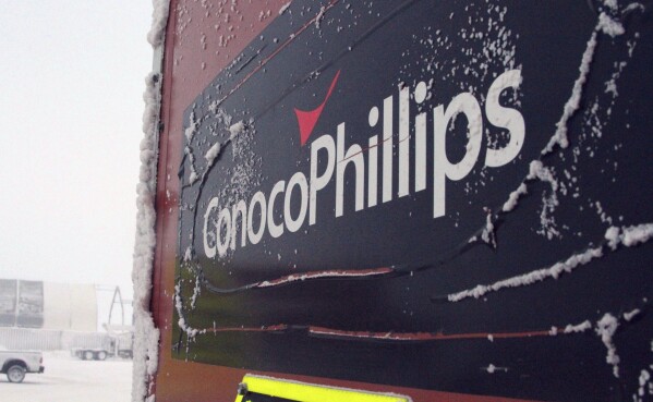 An ice-covered ConocoPhillips sign is displayed at the Colville-Delta 5, more commonly known as CD5, drilling site on Alaska
