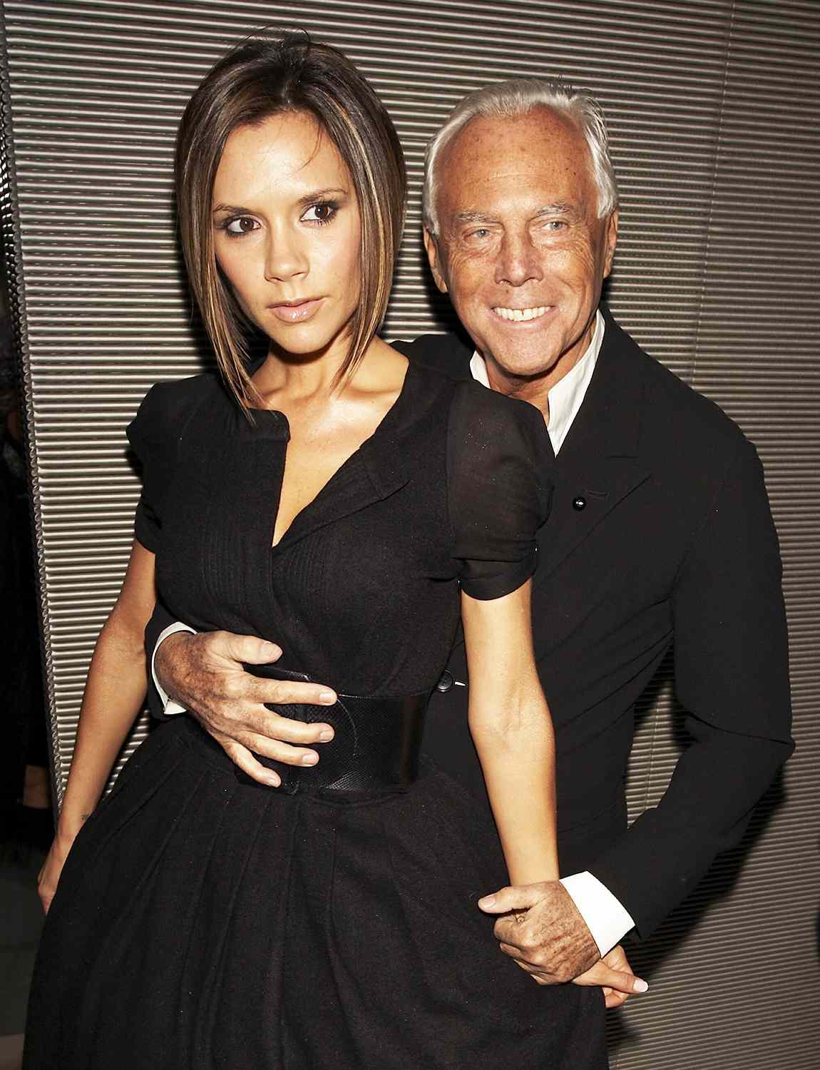 Victoria Beckham and Giorgio Armani