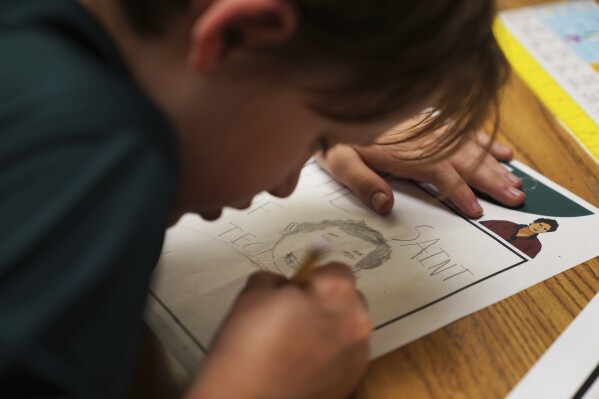 Alex Miller, a fifth-grade student at St. John Berchmans