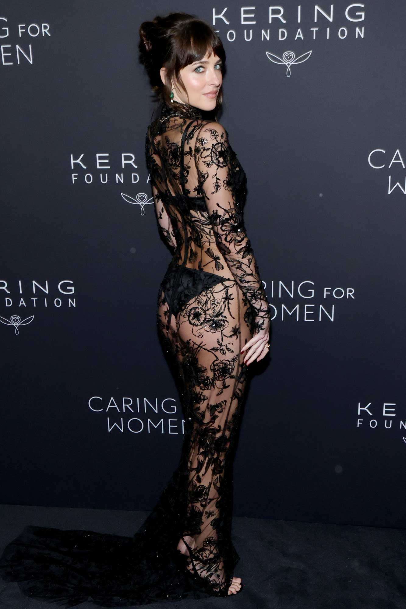 Dakota Johnson attends the Kering Foundation