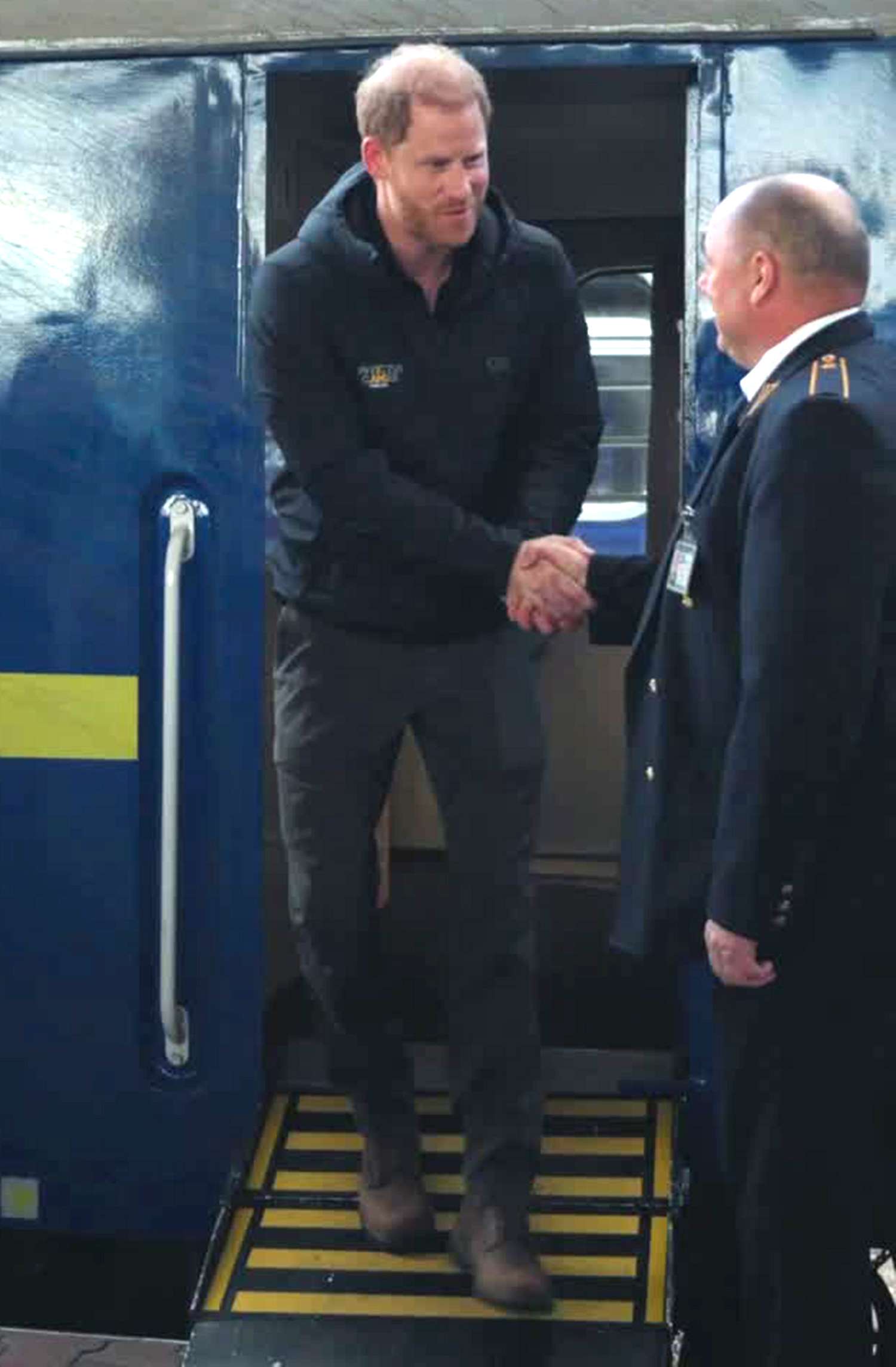 Prince Harry at Invictus Games track and field with Minister Yulia Laputina