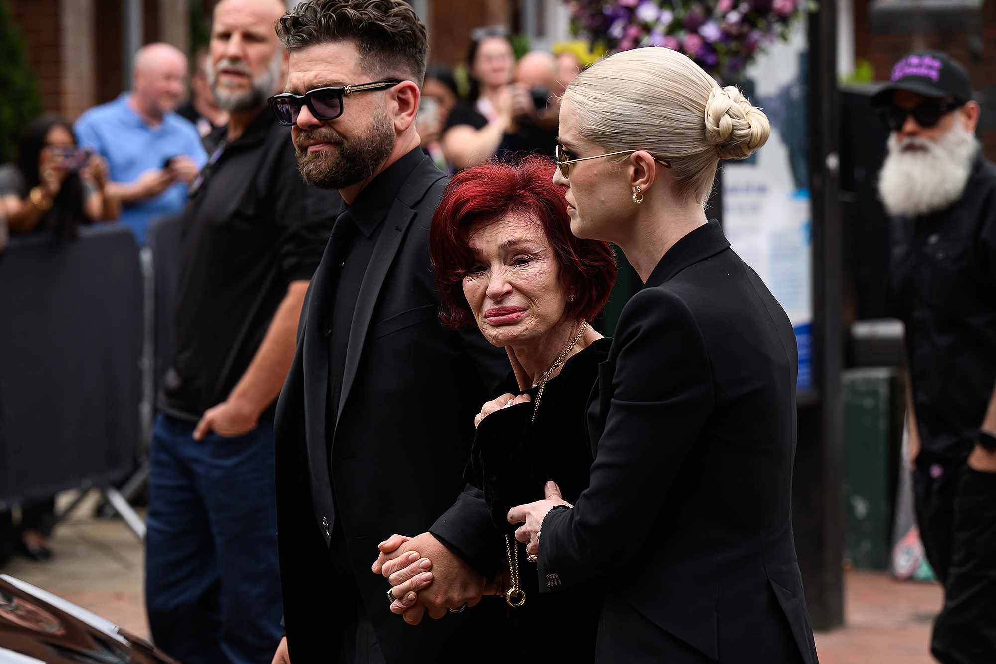Sharon Osbourne engaged in falconry, her new hobby, with a bird of prey.